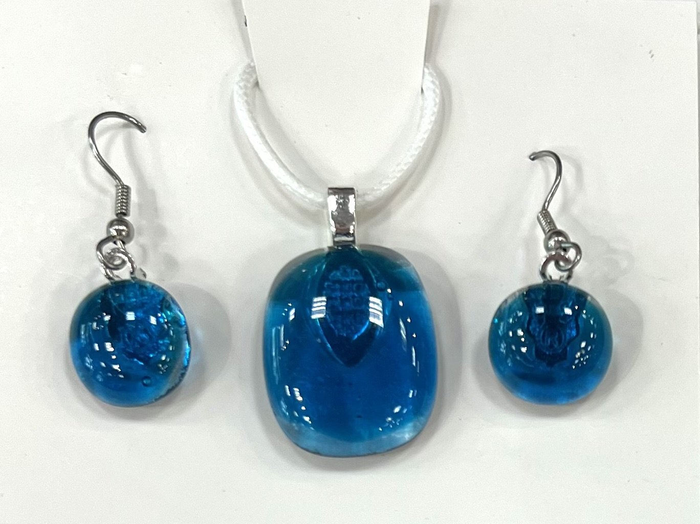 Camille Galli_Earring and Necklace Set in blues_2025_Fused Glass_ 1x.75_$35.jpeg