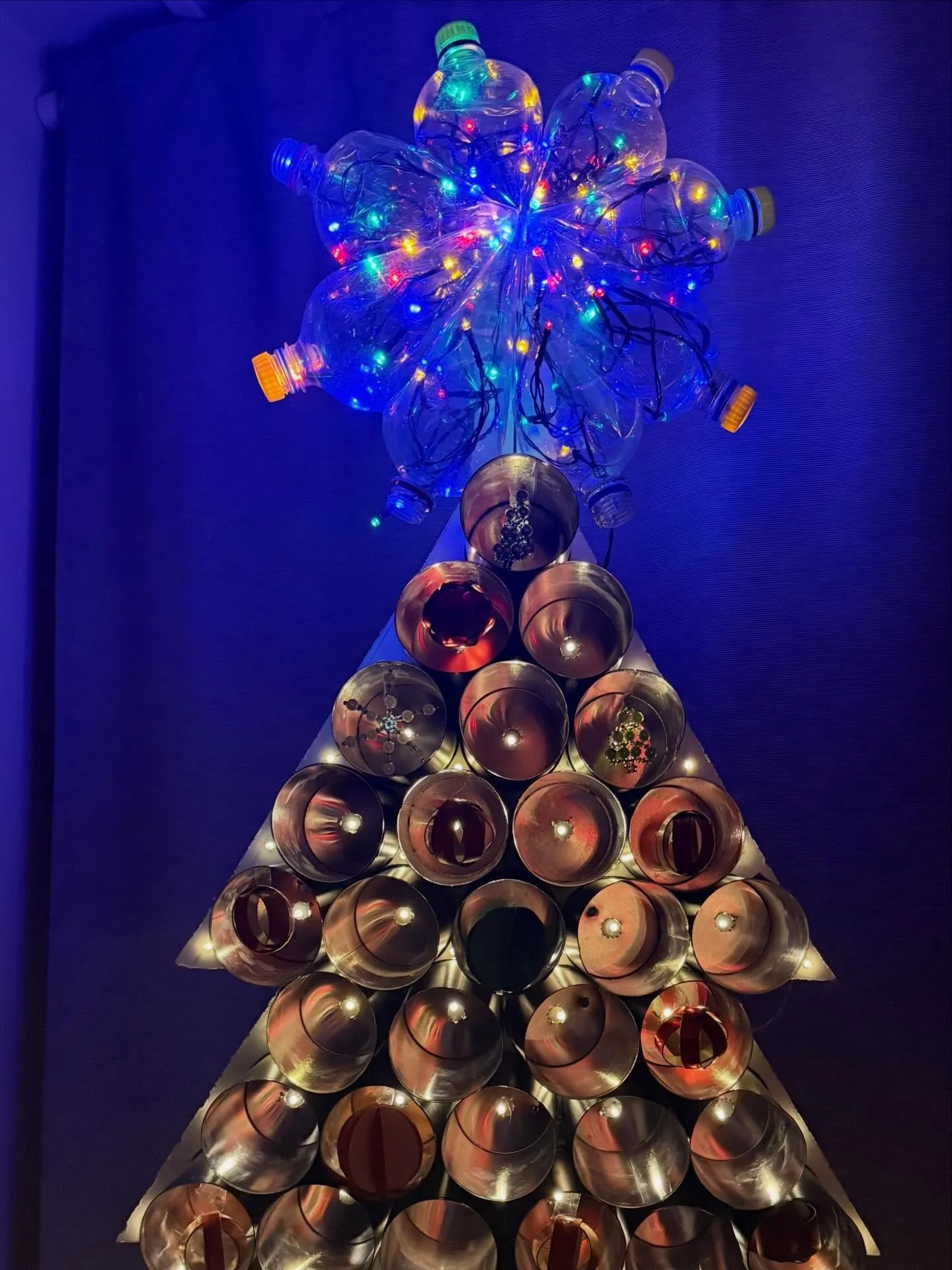 Too much? I&rsquo;ve topped the Christmas can tree with some old connected bottles with added lights! &ldquo;Bottles and cans, just clap your hands
Just clap your hands&hellip;.&rdquo; 👏 🤣 🎄 #recycledchristmas #beck