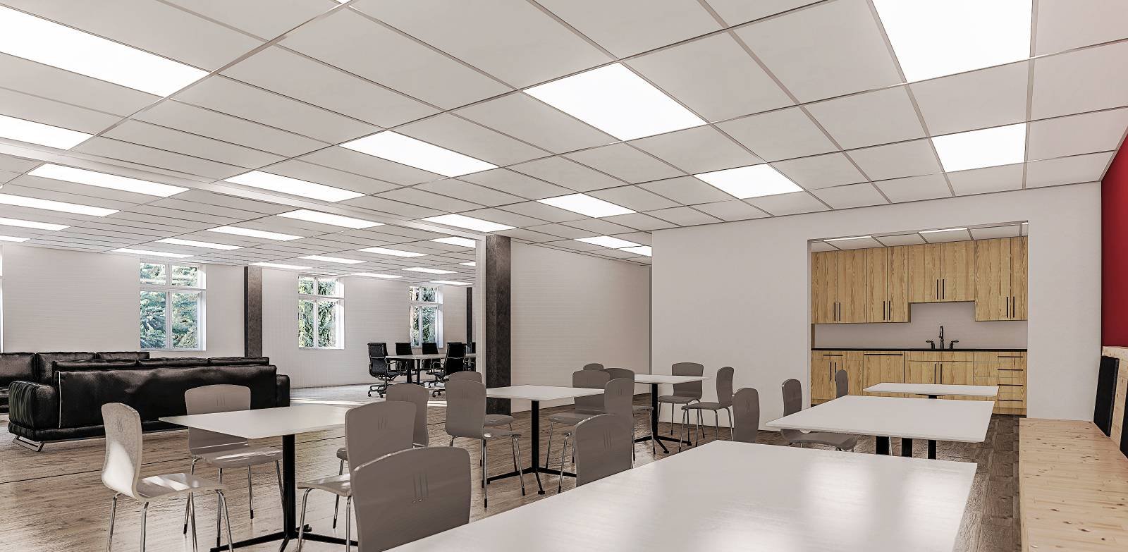 Modern corporate office break room and café area featuring a custom wood-paneled kitchenette with built-in cabinetry, flexible café-style tables with white and gray seating, contemporary black leather lounge sofas, recessed LED panel lighting, large 