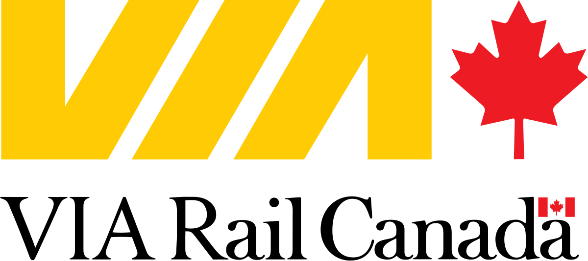 A logo with yellow capital letters spelling 'VIA' with black diagonal stripes in the letters, a red maple leaf on the right, and the phrase 'Made in Canada' below.