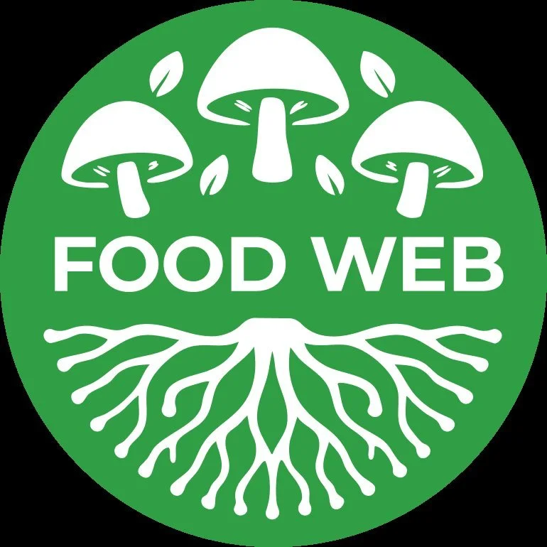 Green circular logo with three white mushrooms at the top and white tree roots at the bottom. The text 'FOOD WEB' is centered between the mushrooms and roots.
