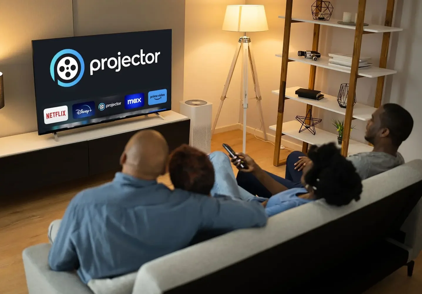 Four people watching a television in a living room