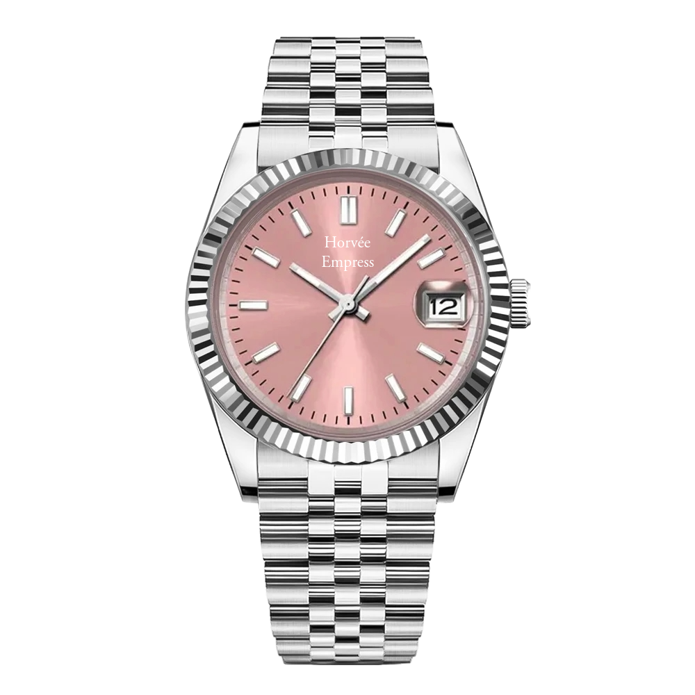 A silver wristwatch with a pink face, silver hour markers, and hands. It has a date display at 3 o'clock and a ridged bezel. The bracelet is a silver metal link band.