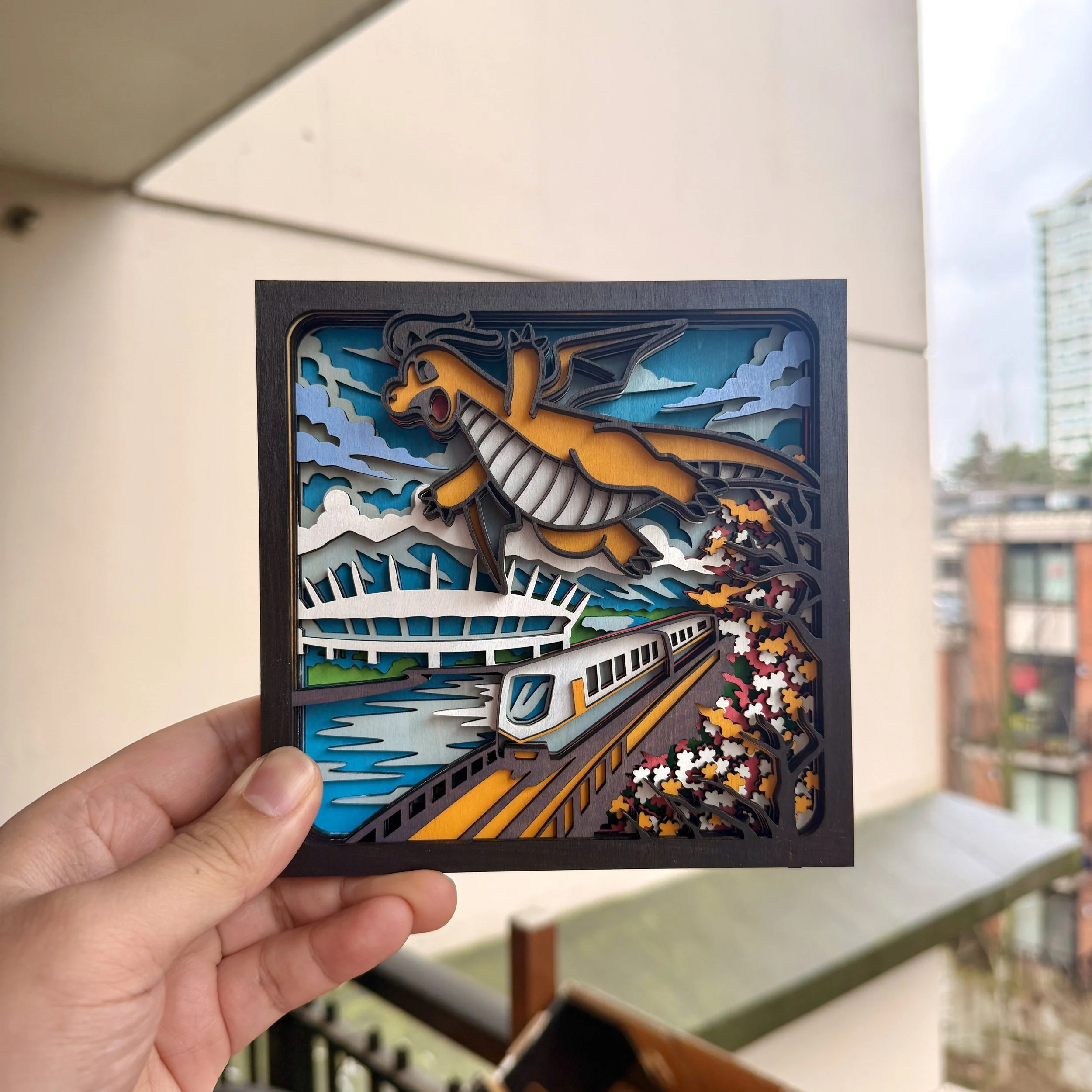 Dragonite Over Vancouver – 3D Layered Wooden Display