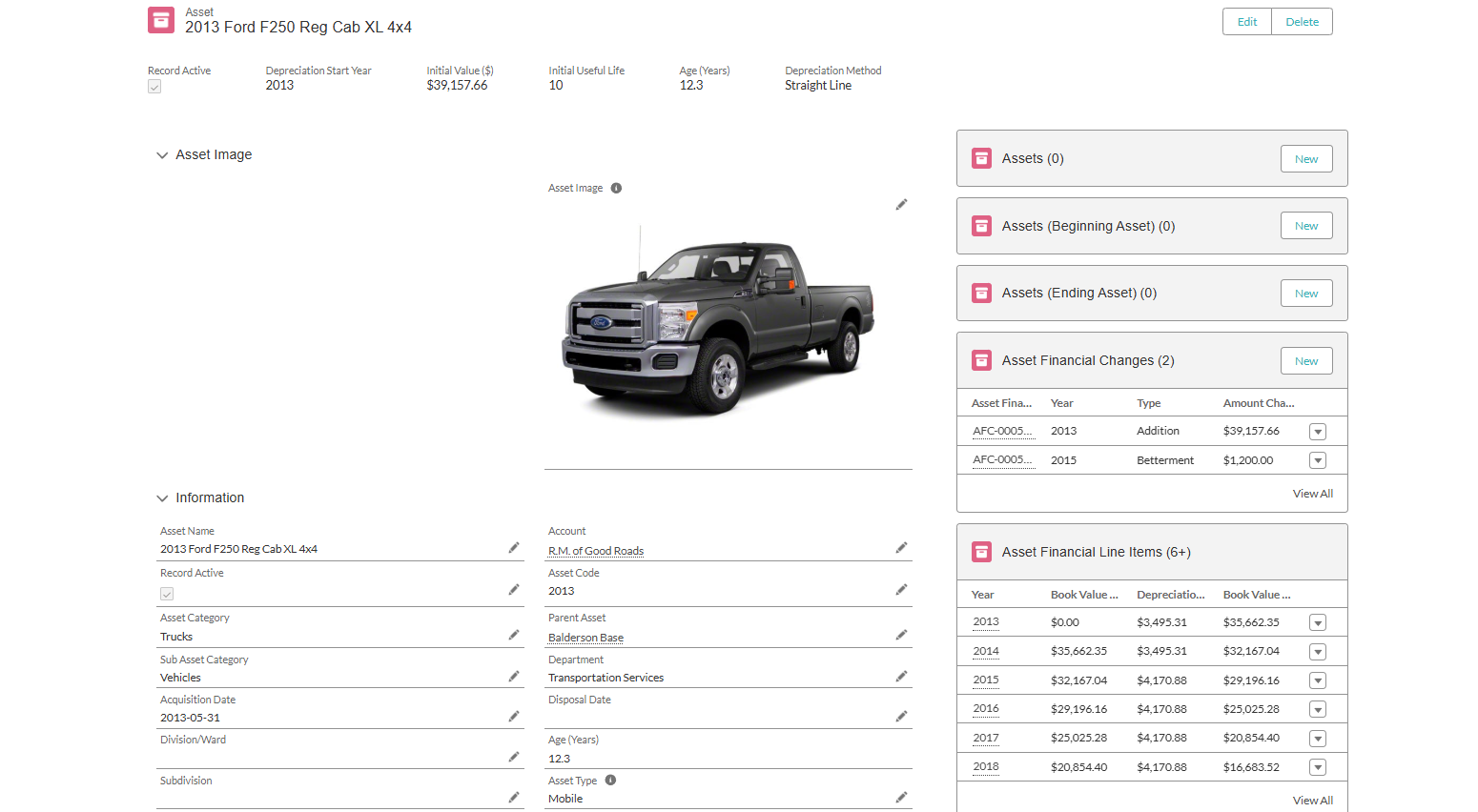 Asset record card displaying detailed information for a single asset, including related assets and financial changes