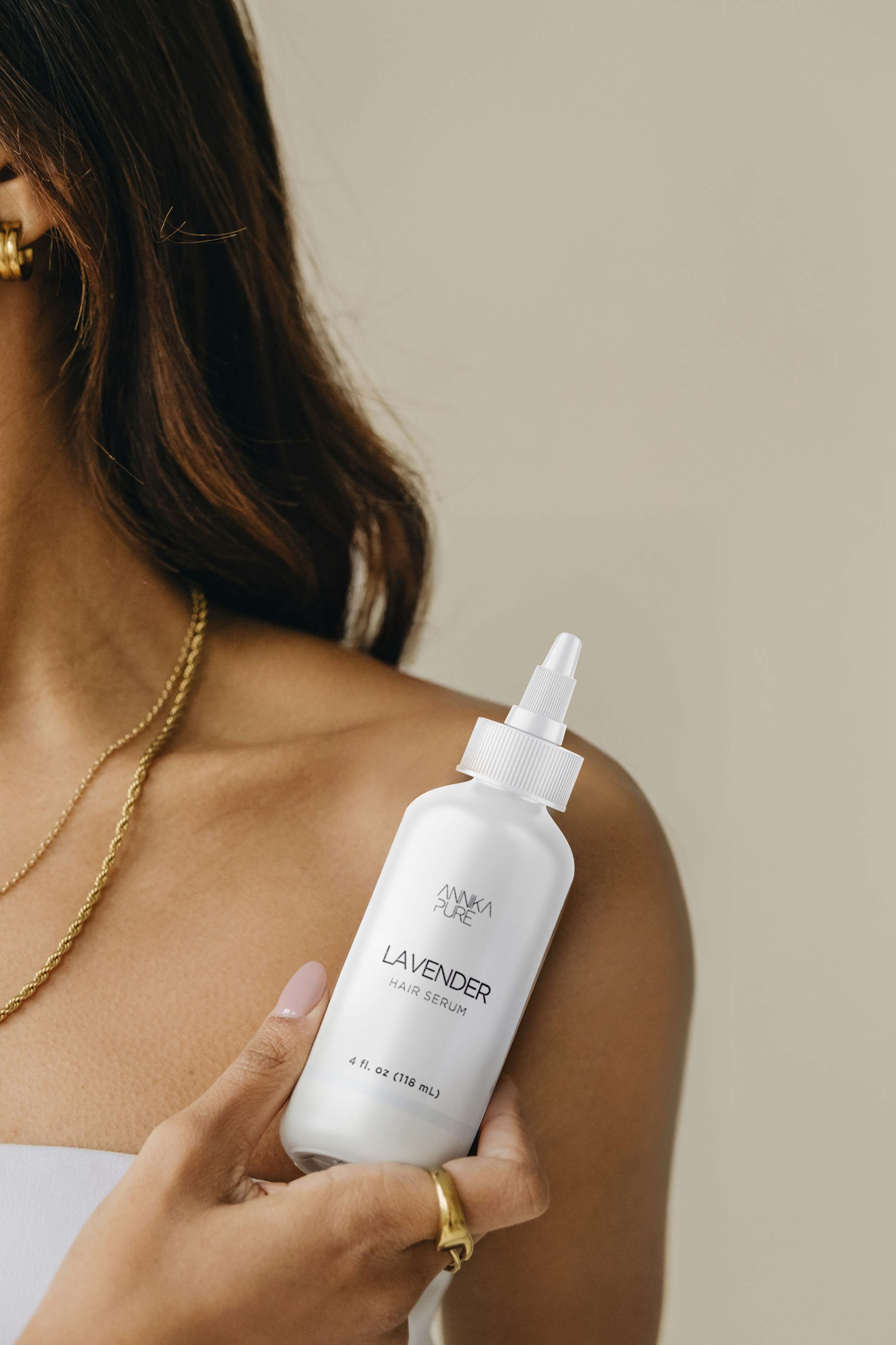 AnnikaPure_HairSerum_Hand_Lavender.png