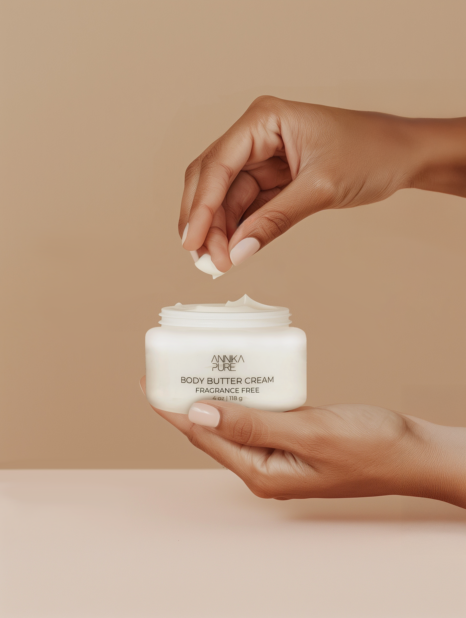 AnnikaPure_Mockup_BodyButter_InHand_FragranceFree_PDPOnly.png