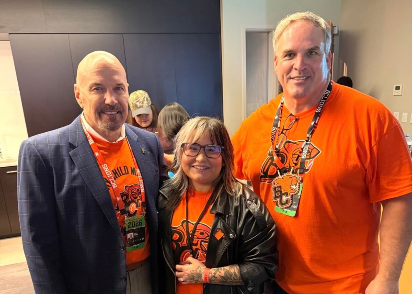  Left to right: George Chayka (BC Lions Senior Vice President of Business), Kirsten Whitney (MarCom Brand Specialist at IRSSS), and Jamie Taras (BC Lions Director of Community Partnerships) 