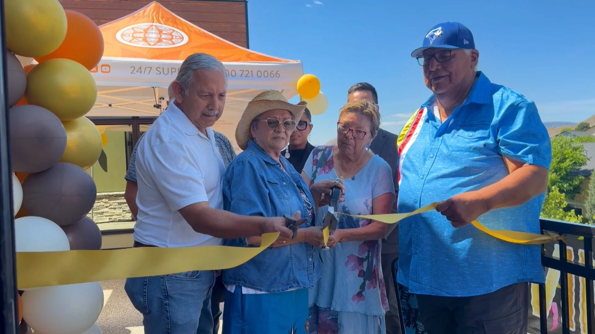 Ribbon cutting ceremony at IRSSS Kamloops Office grand opening