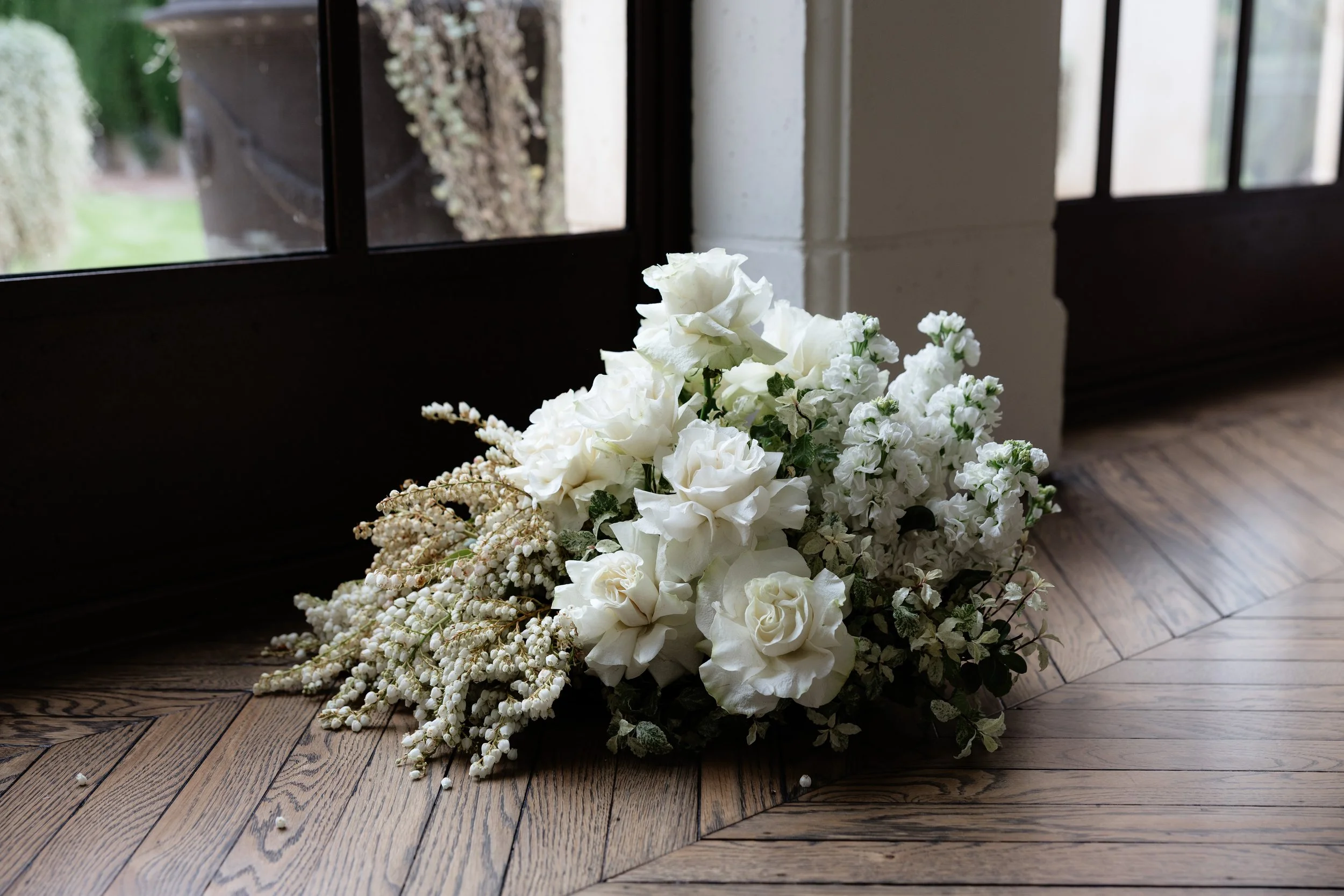 A white and green wedding floral arrangement by Adelaide Flower House. Captured by Adelaide Wedding Photographer, Woodley Photography