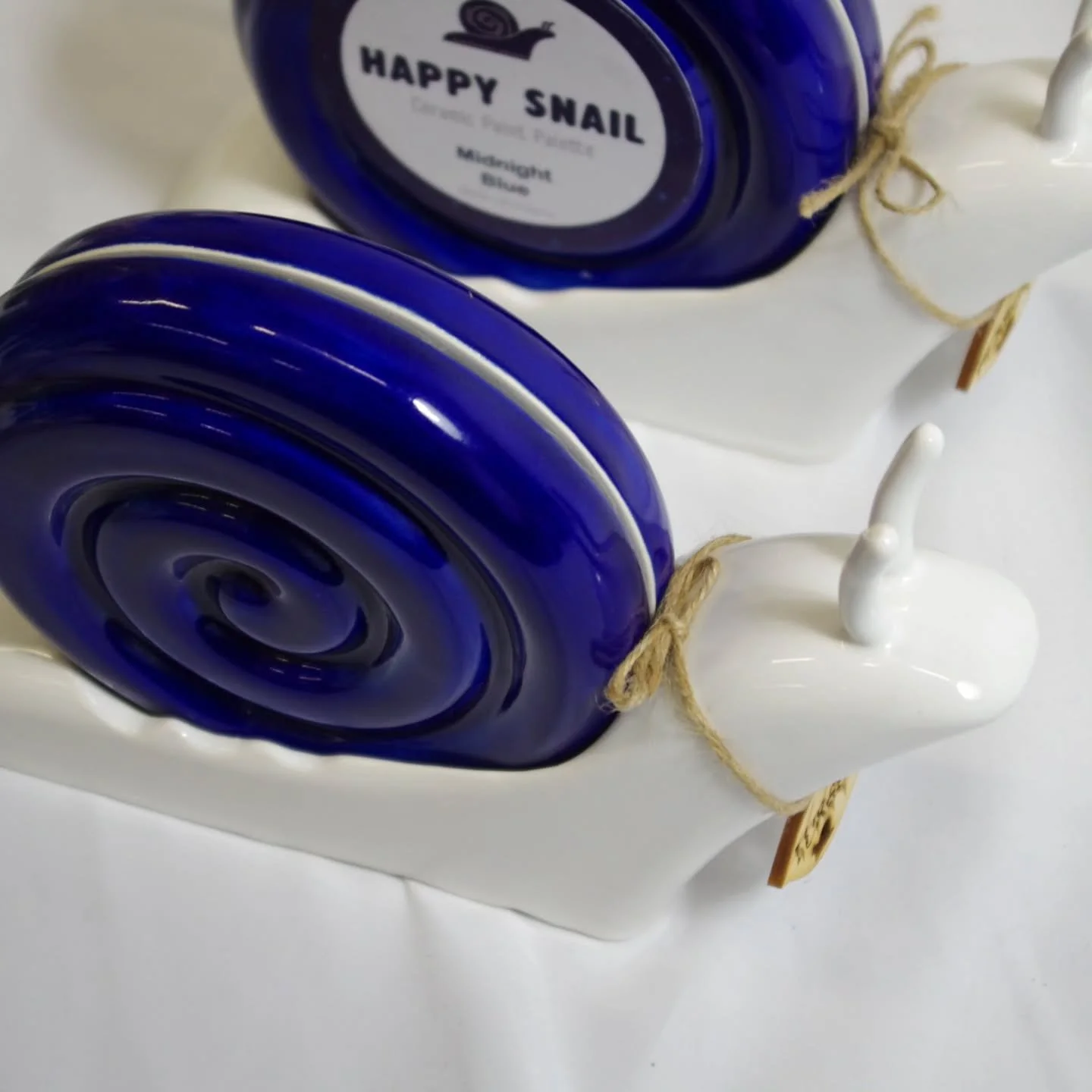 These Happy Snails will be slowly making their way to Bovey Tracey Craft Festival on June 12-14th 🐌
@craftfestival 

I've been enjoying experimenting with different glazes and stains for this project, can't wait to see how the speckled test looks on