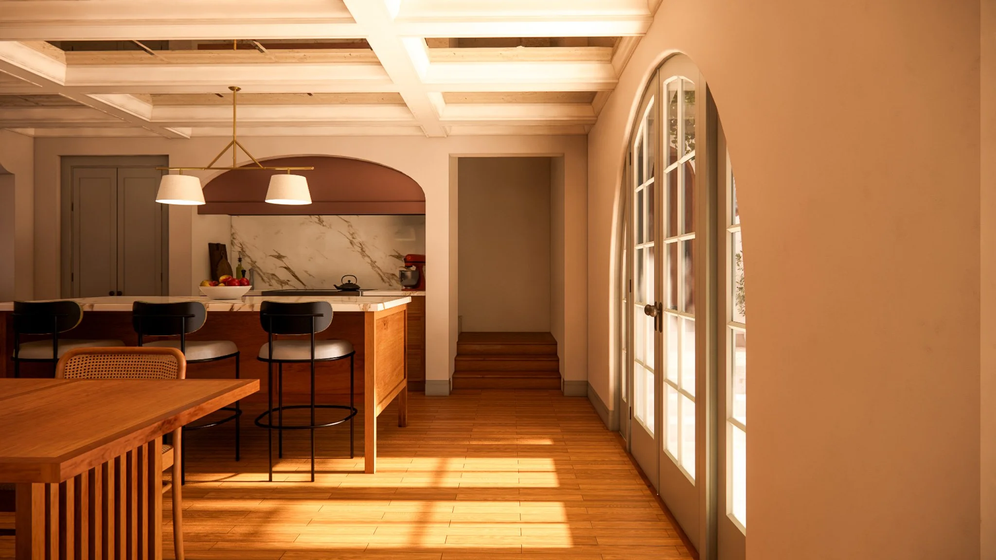 Cozy kitchen with a marble-topped island, black barstools, a fruit bowl, and large arched windows letting in natural light.