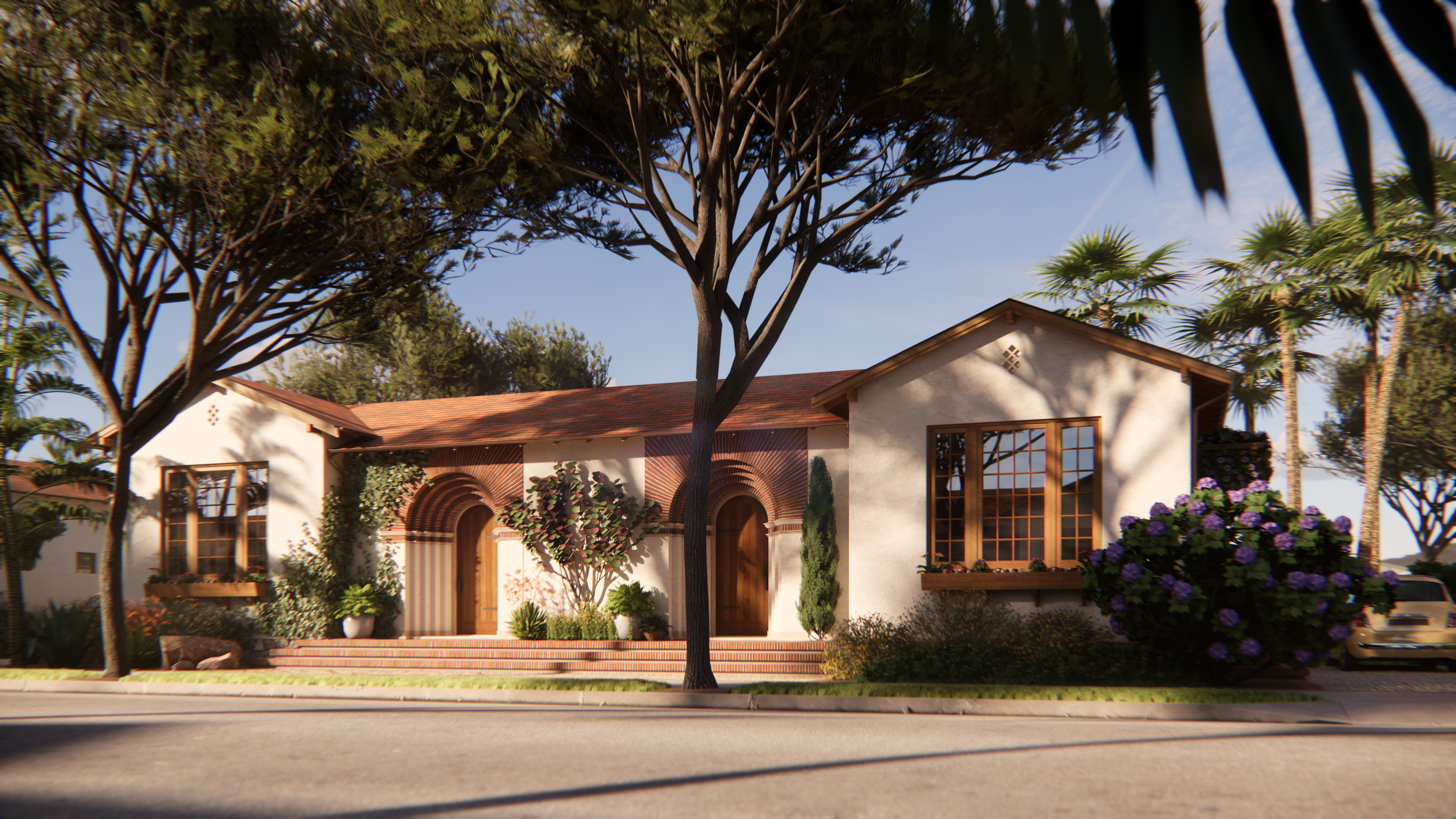 Spanish-style house with arched entrance, large windows, and surrounding trees and shrubs in a sunny setting.