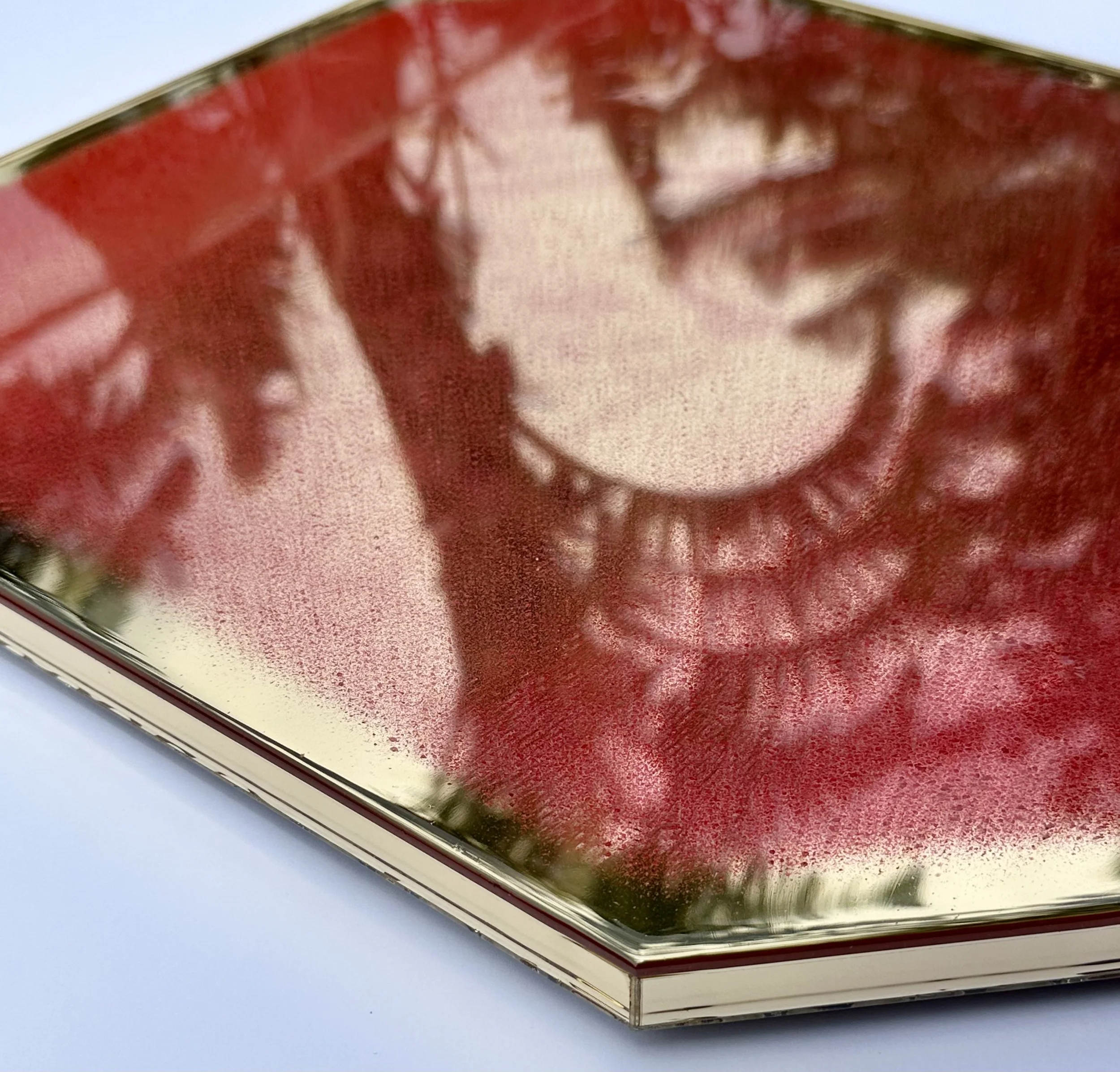 Alizarin abstract.  2025.  Tempera and resin on grey-mirrored Perspex.  45 x 48cm.  (reflection off the mirror from the tree next to the studio)