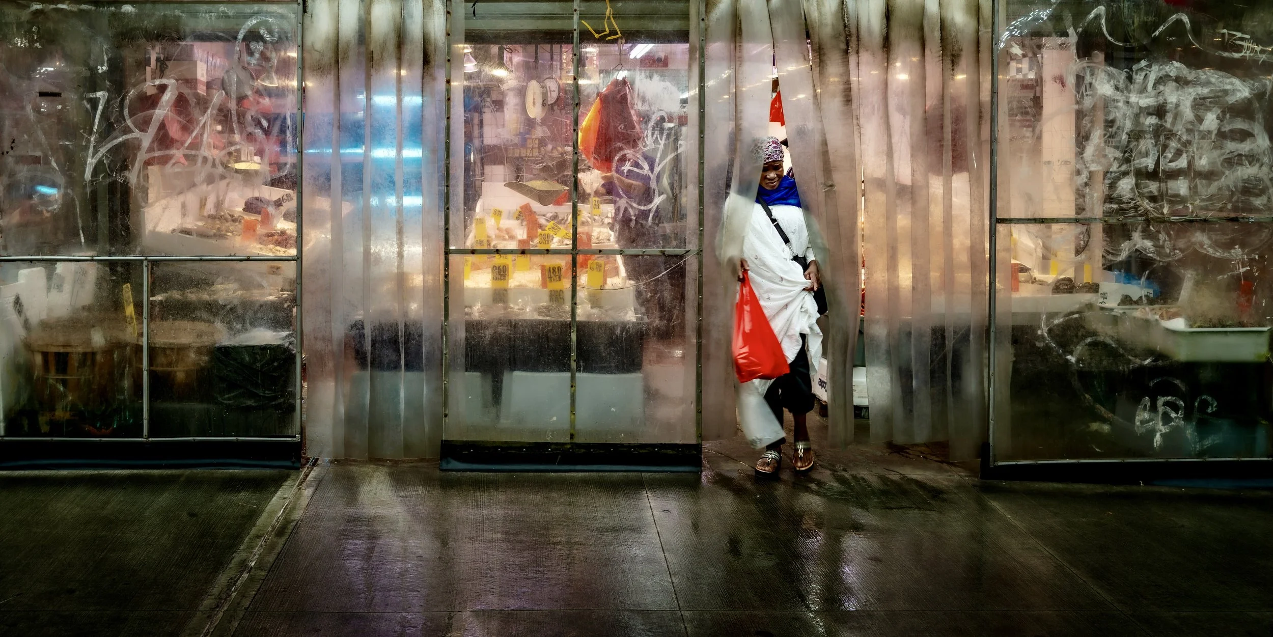  Soft Exit  
Chinatown, New York City, NY, USA • August 13, 2025   
Camera:  Leica Q3. ISO 100 f2.8 1/60s