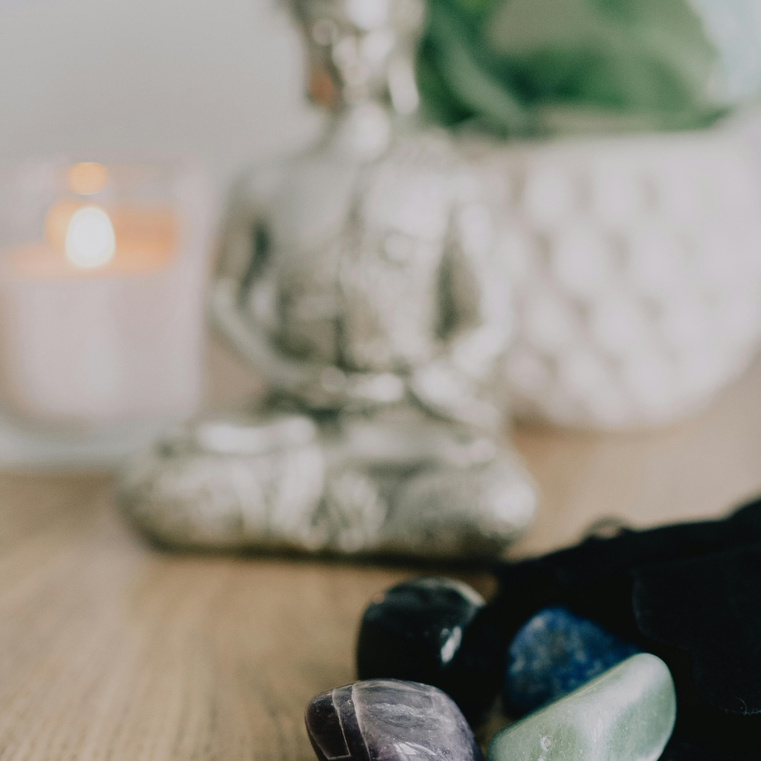 Assortment of healing stones in a tranquil space for energy work and spiritual grounding