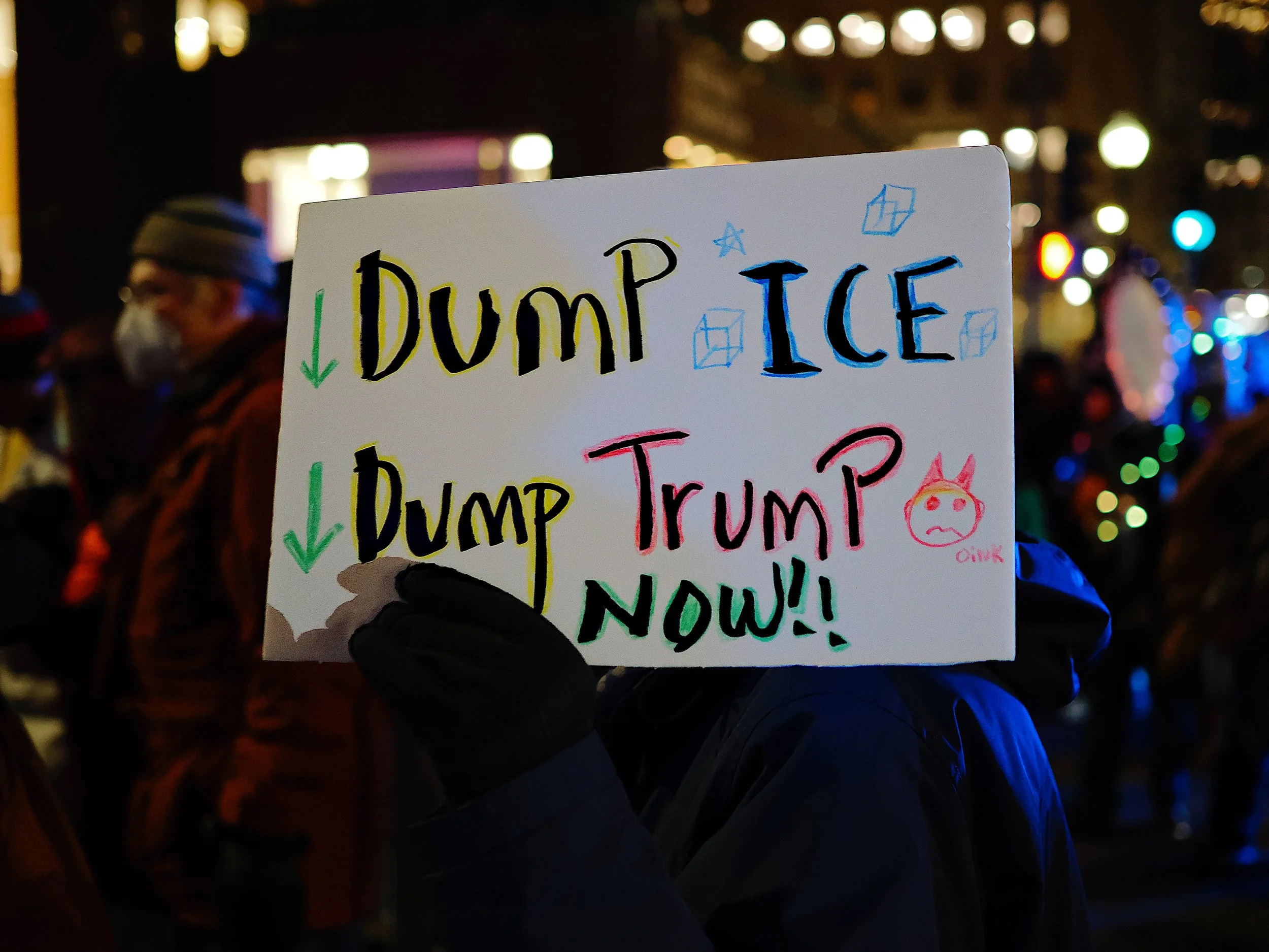 A sign at a Mass Fifty Fifty One demonstration that says "Dump ICE. Dump Trump Now!!"