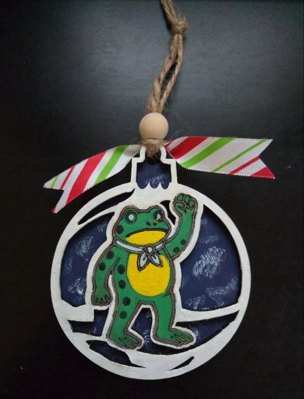 An ornament of "resistance frog" holding up his fist in solidarity