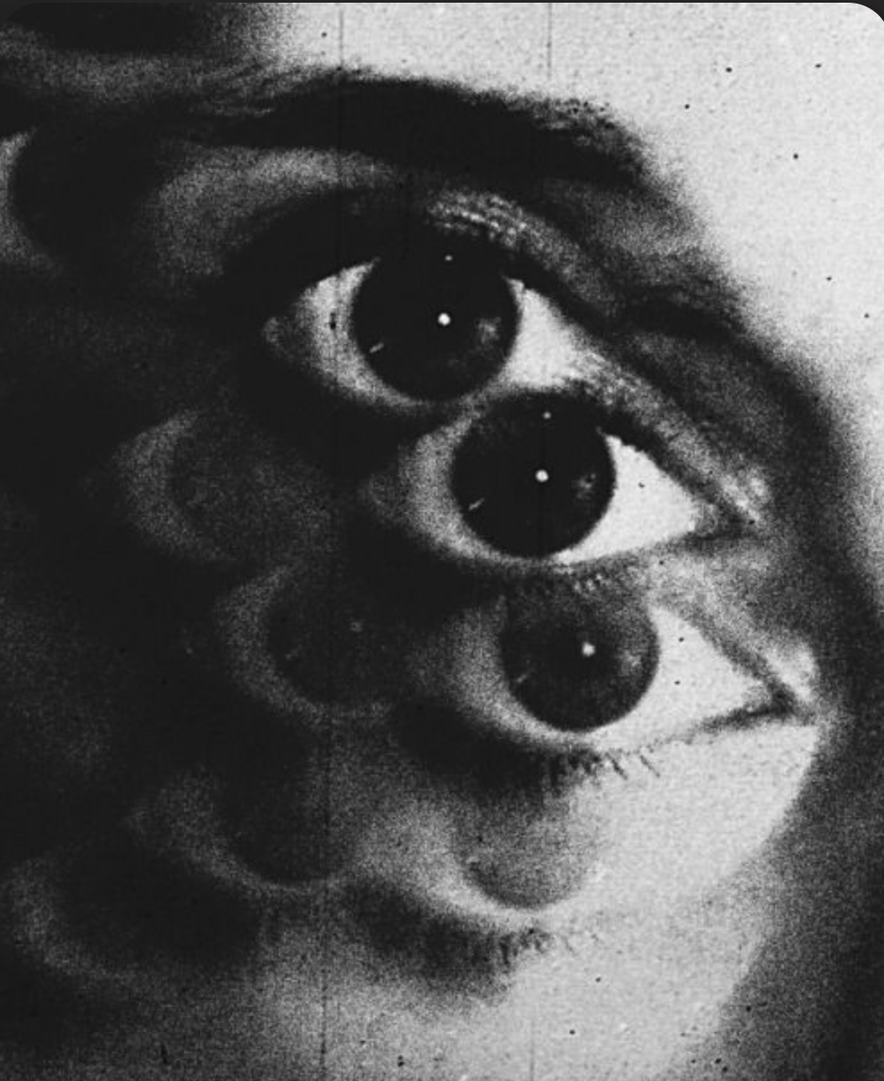 A black and white image of a face with three eyes. The eyes are arranged vertically, and the image has a surreal, distorted appearance. A creative interpretation for Eye Movement Desensitization Reprocessing.