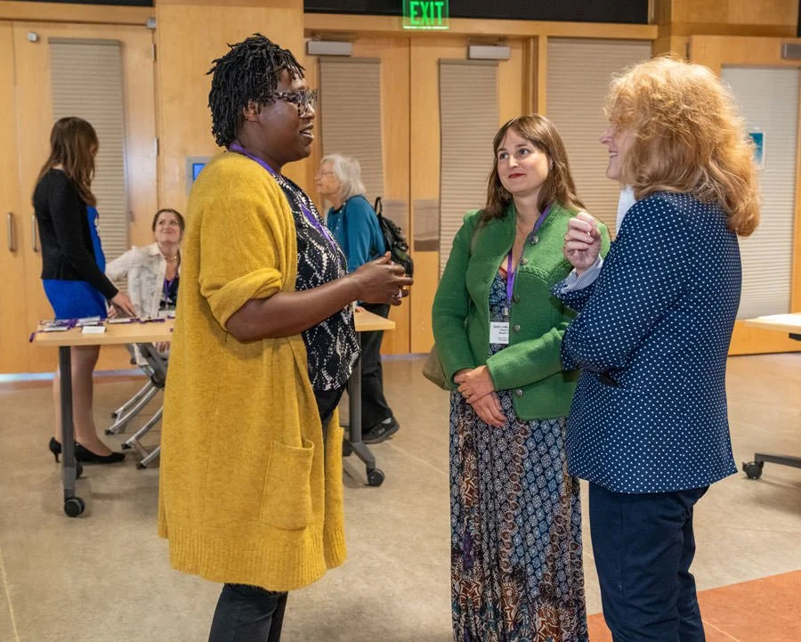 conference attendees talking to each other