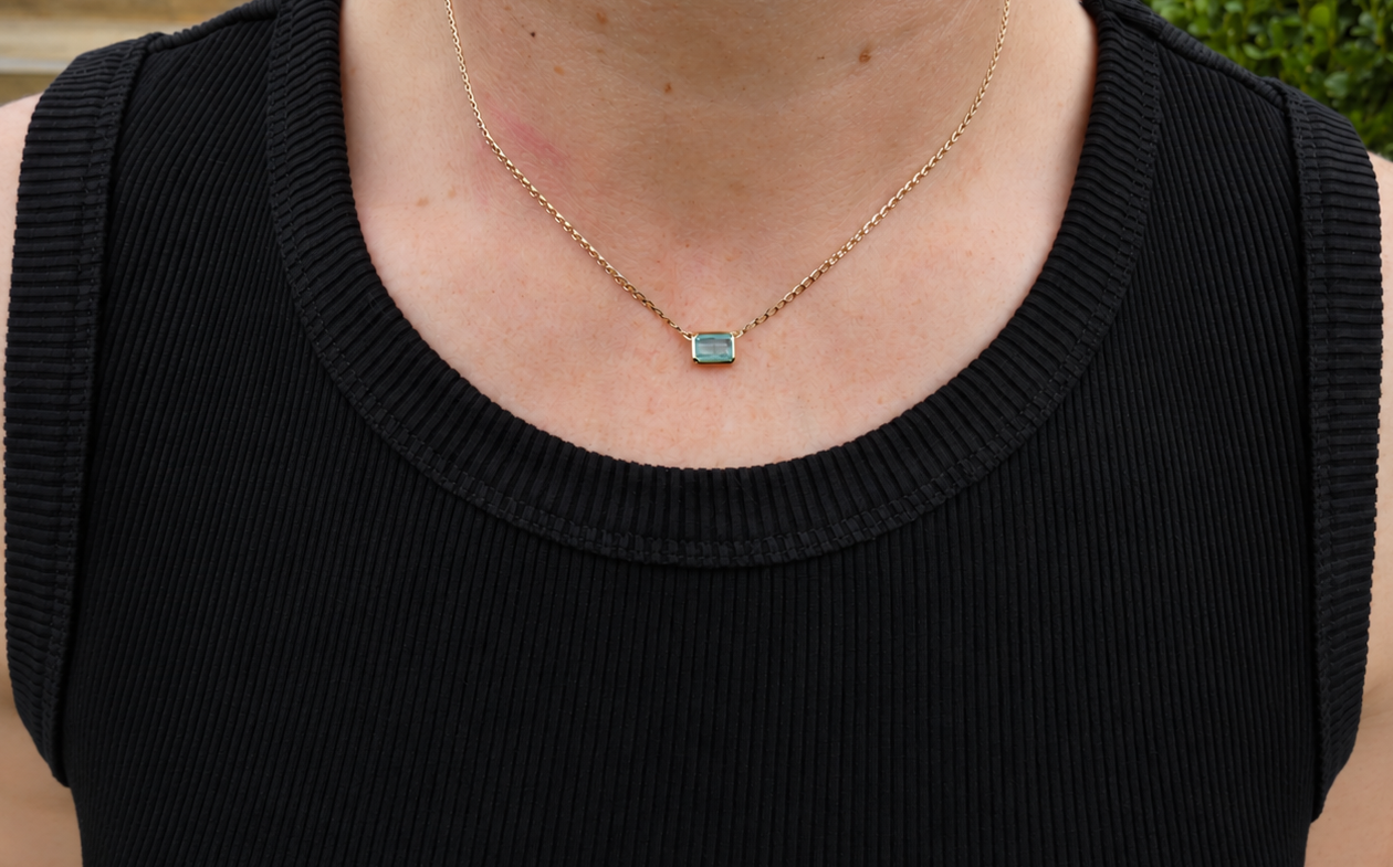Clean Black Ribbed Top with Pendant.png