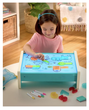 Child playing with a colorful sensory light table featuring shapes and markers in a bright playroom setting