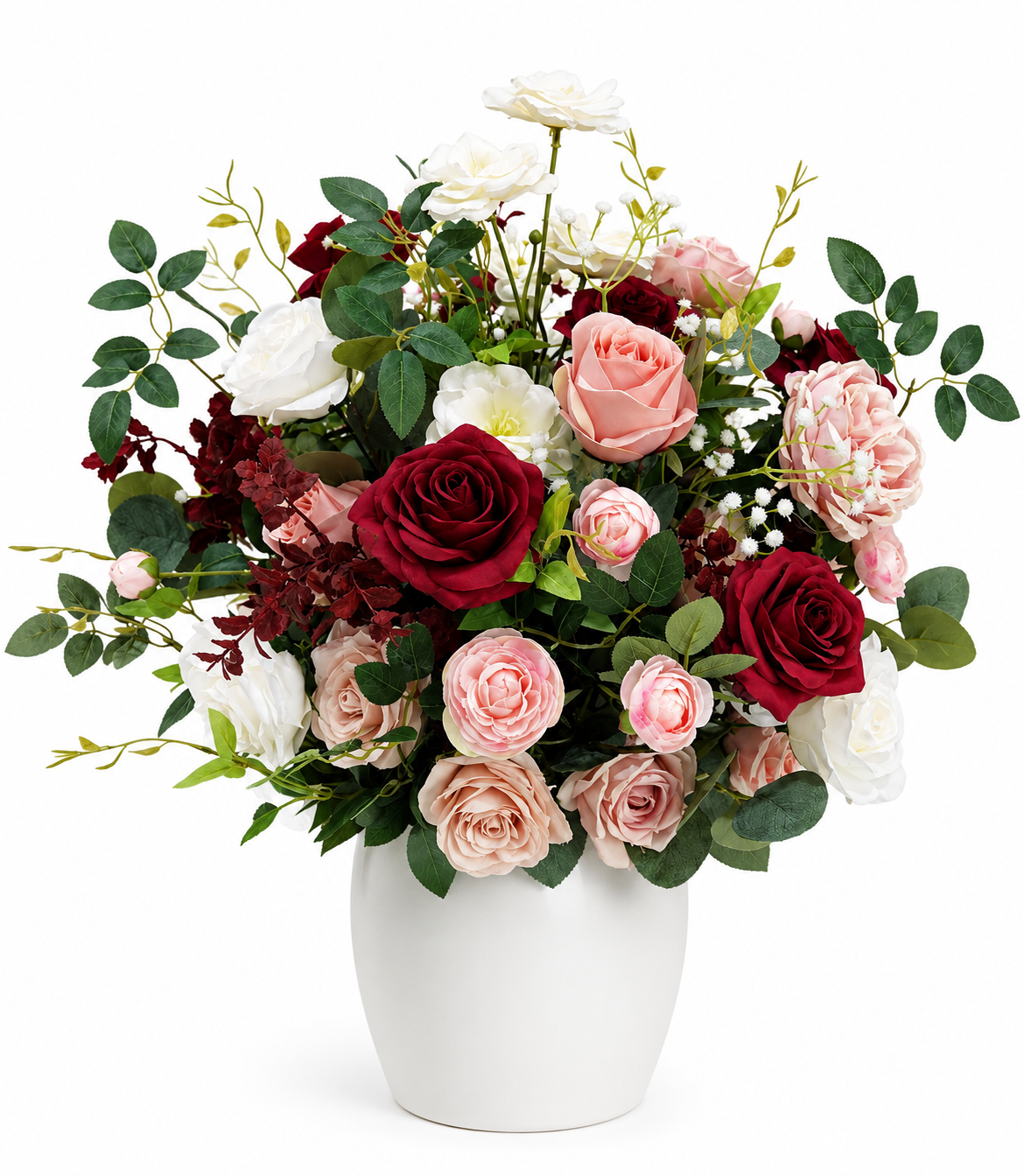 Artificial floral arrangement with burgundy, blush pink, and white roses, eucalyptus greenery, and accent flowers in a white ceramic vase on a white background.