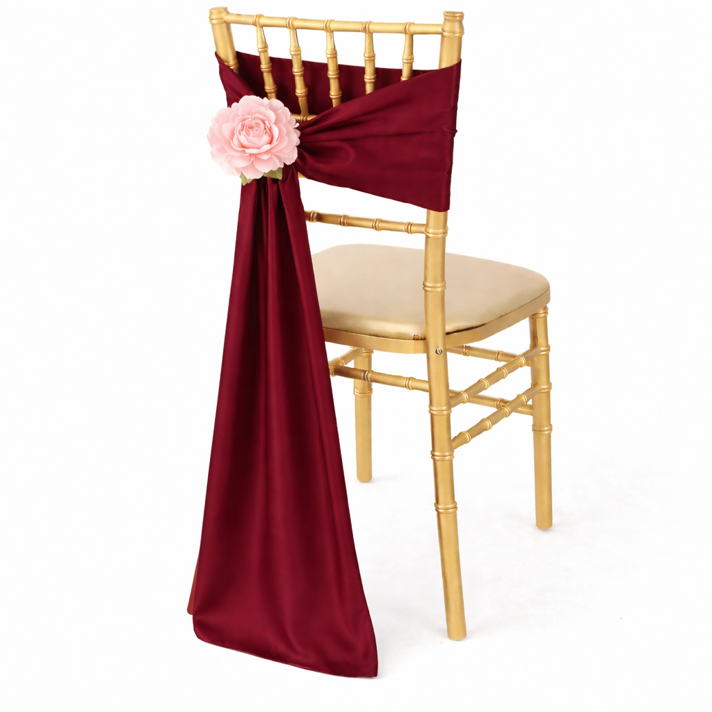 Burgundy satin chair sash with pink floral accent on gold Chiavari chair, elegant wedding chair decor rental in Portland Oregon