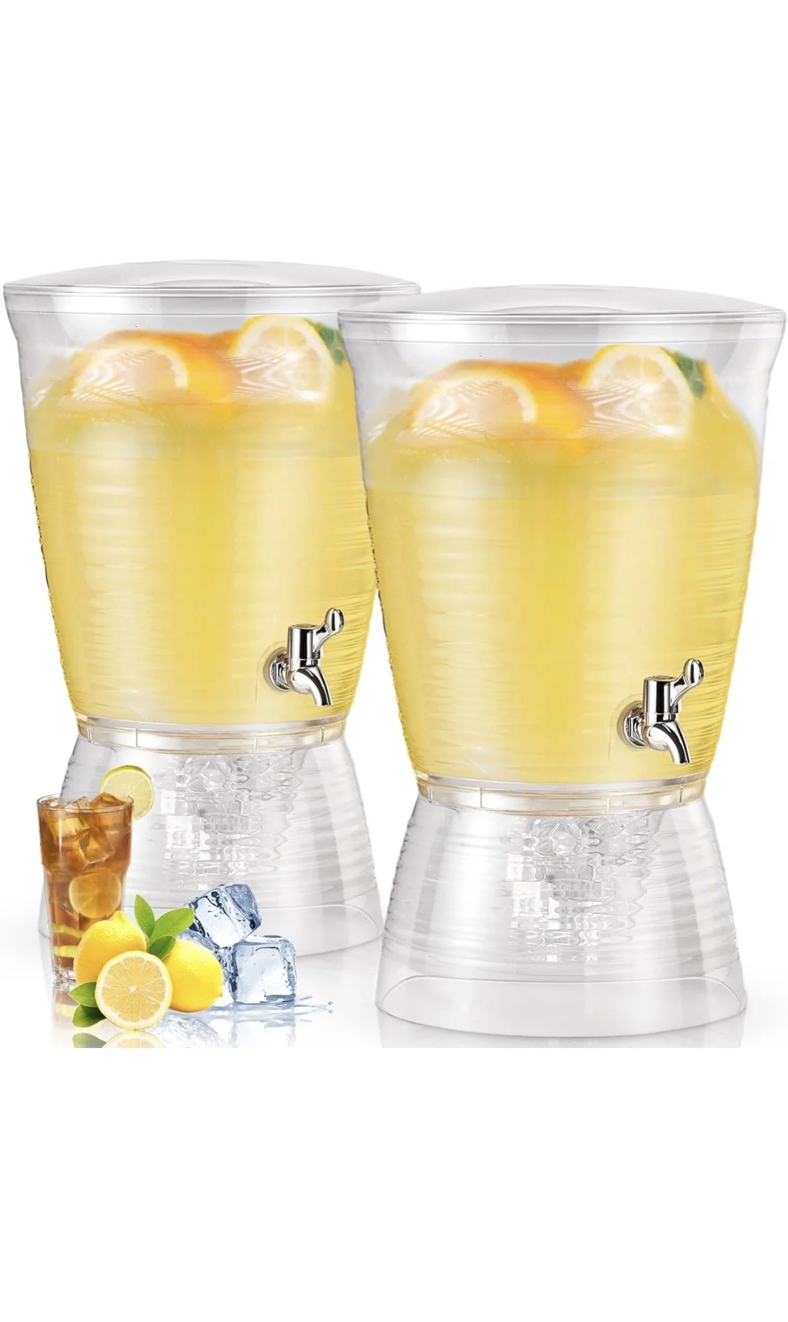 Two clear beverage dispensers filled with lemonade, each with a spigot, placed side by side with lemon slices, ice cubes, and a glass of iced tea on a clean white background.