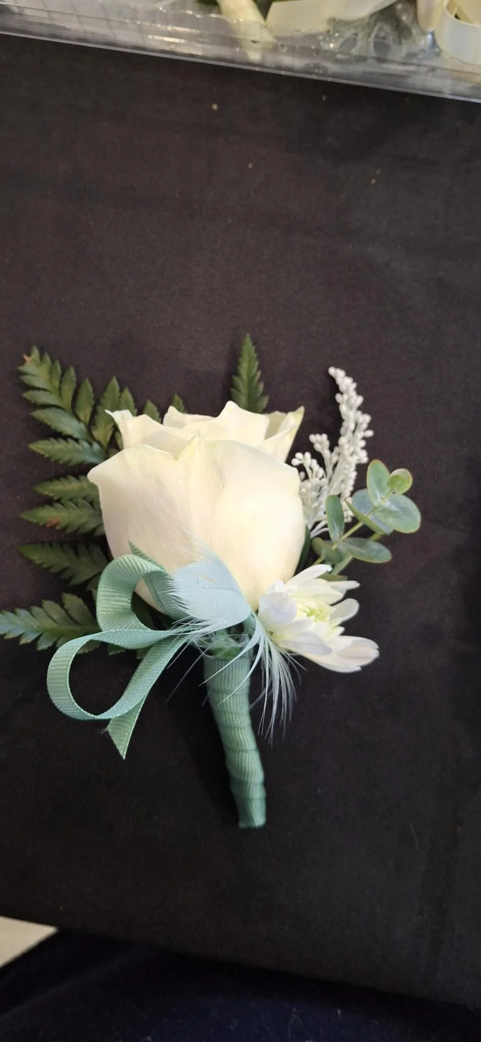 white rose buttonhole