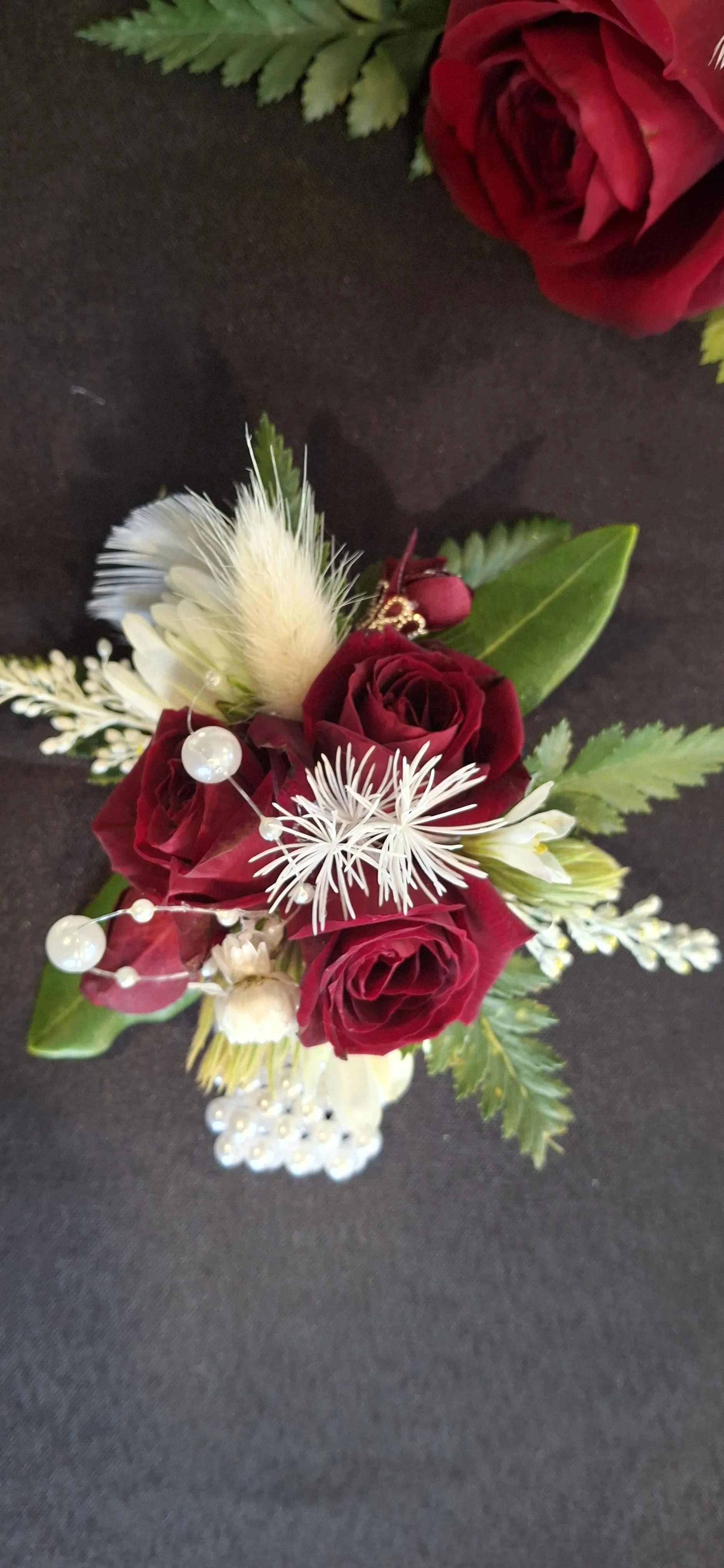 white & red rose wristlet