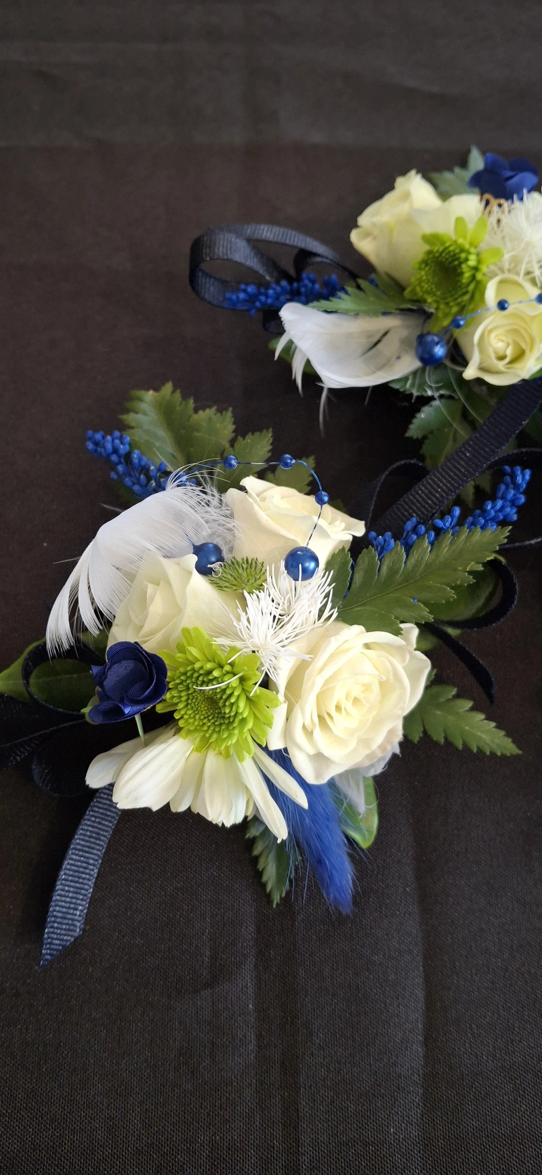white and blue wristlet
