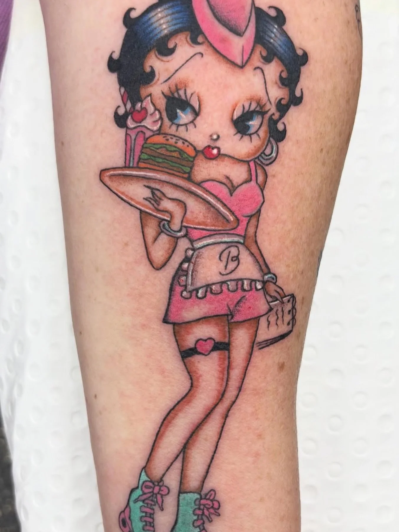 Betty looking vibrant by @faymous_tattoo
