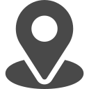 Placeholder map pin icon on a dark background