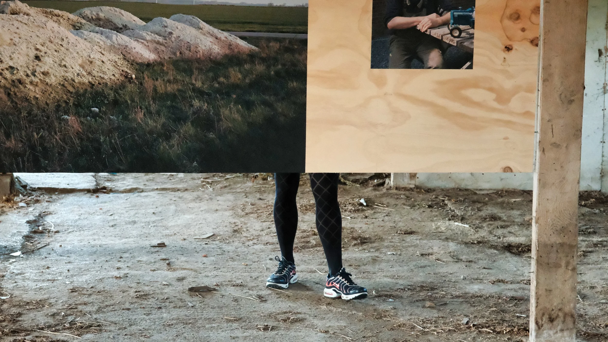 At the Other Side of the Photographs She Stands - Molenbaix