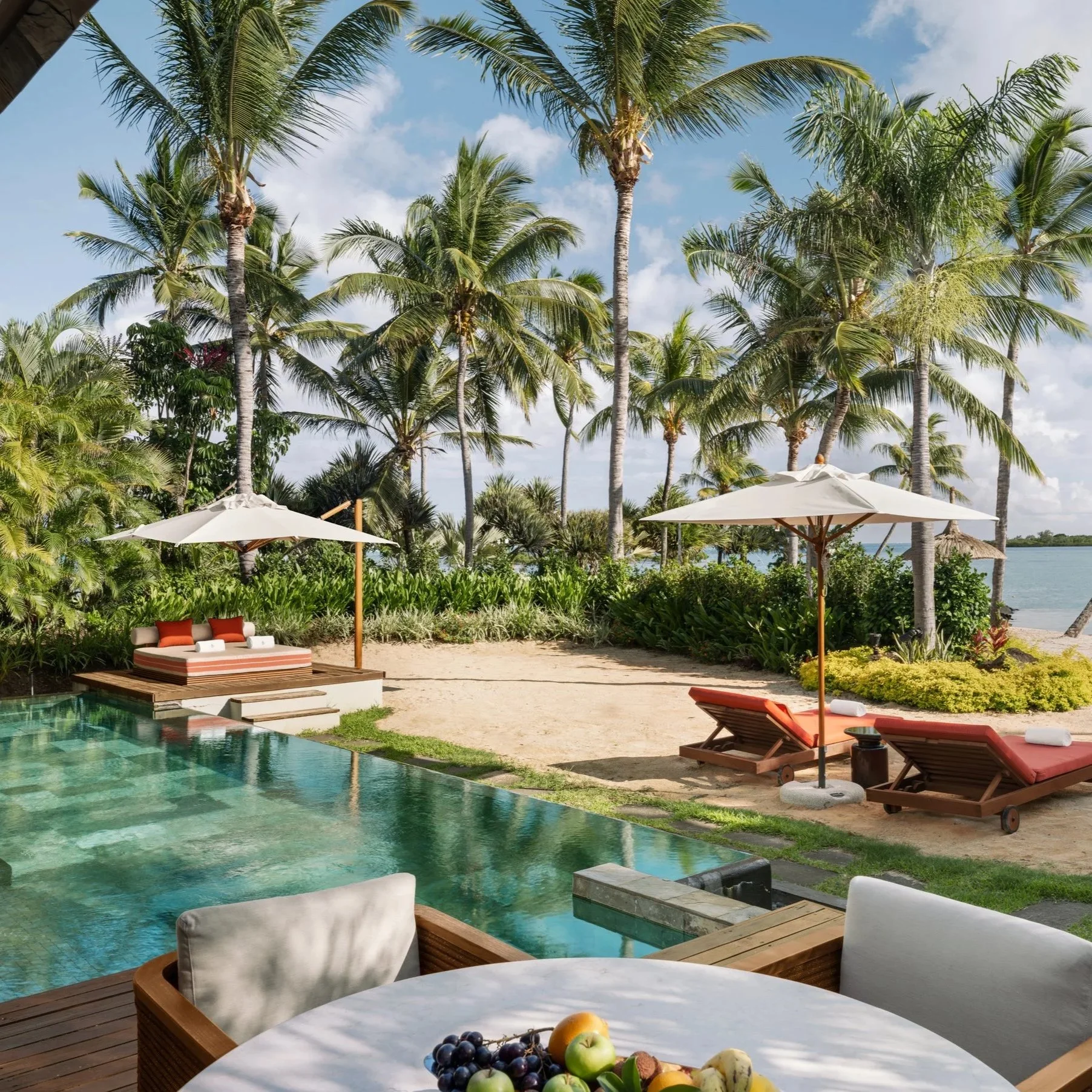 Olivia Adler’s luxury hotel interior styling. Stunning photography by John Athimaritis for Four Seasons Resort Mauritius at Anahita. Interior Design by 1508 London.