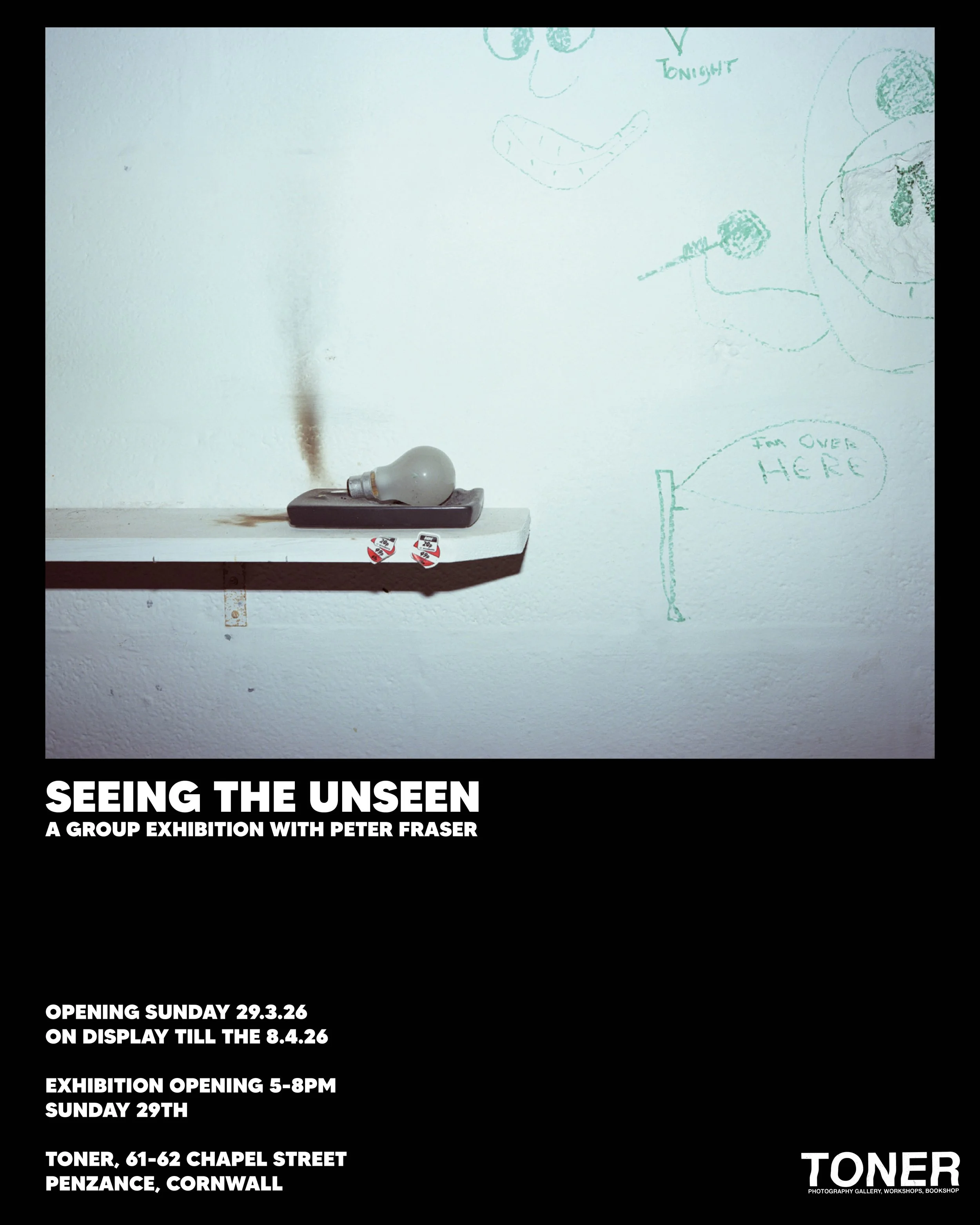 An art exhibition poster titled "Seeing the Unseen" by Peter Fraser, showing a lit light bulb with smoke rising, placed on a surface. Behind it, there are doodles on the wall, including a cartoon face, a flag, and speech bubbles with text. The lower part of the poster provides exhibition details, including dates, times, and location at Toner, Penzance, Cornwall.