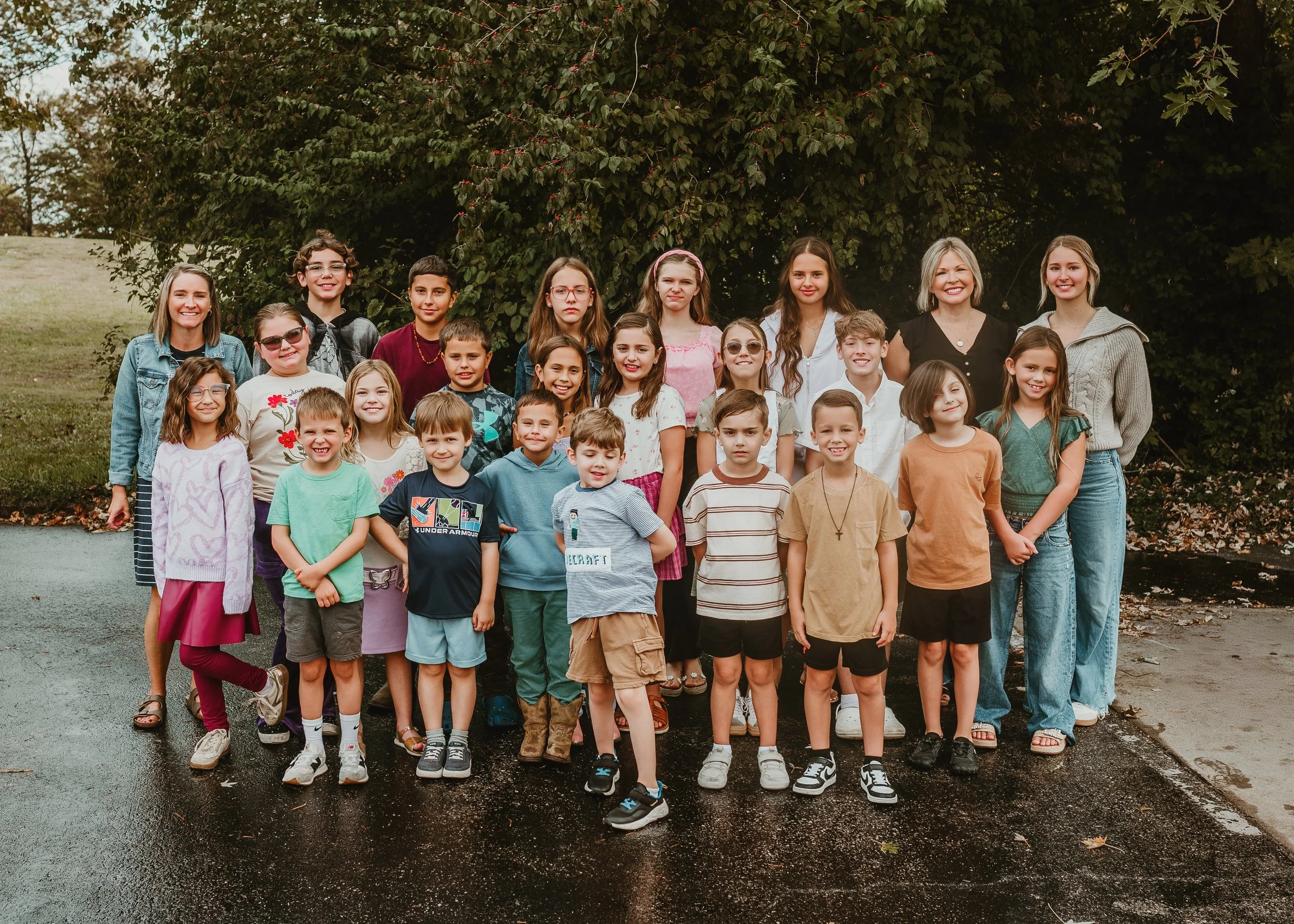 Group of smiling children with backpacks