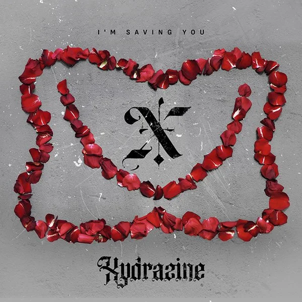 Heart shape made of red rose petals with the text 'I'm saving you' at the top and 'Hydrangea' at the bottom, and a black decorative symbol in the center.