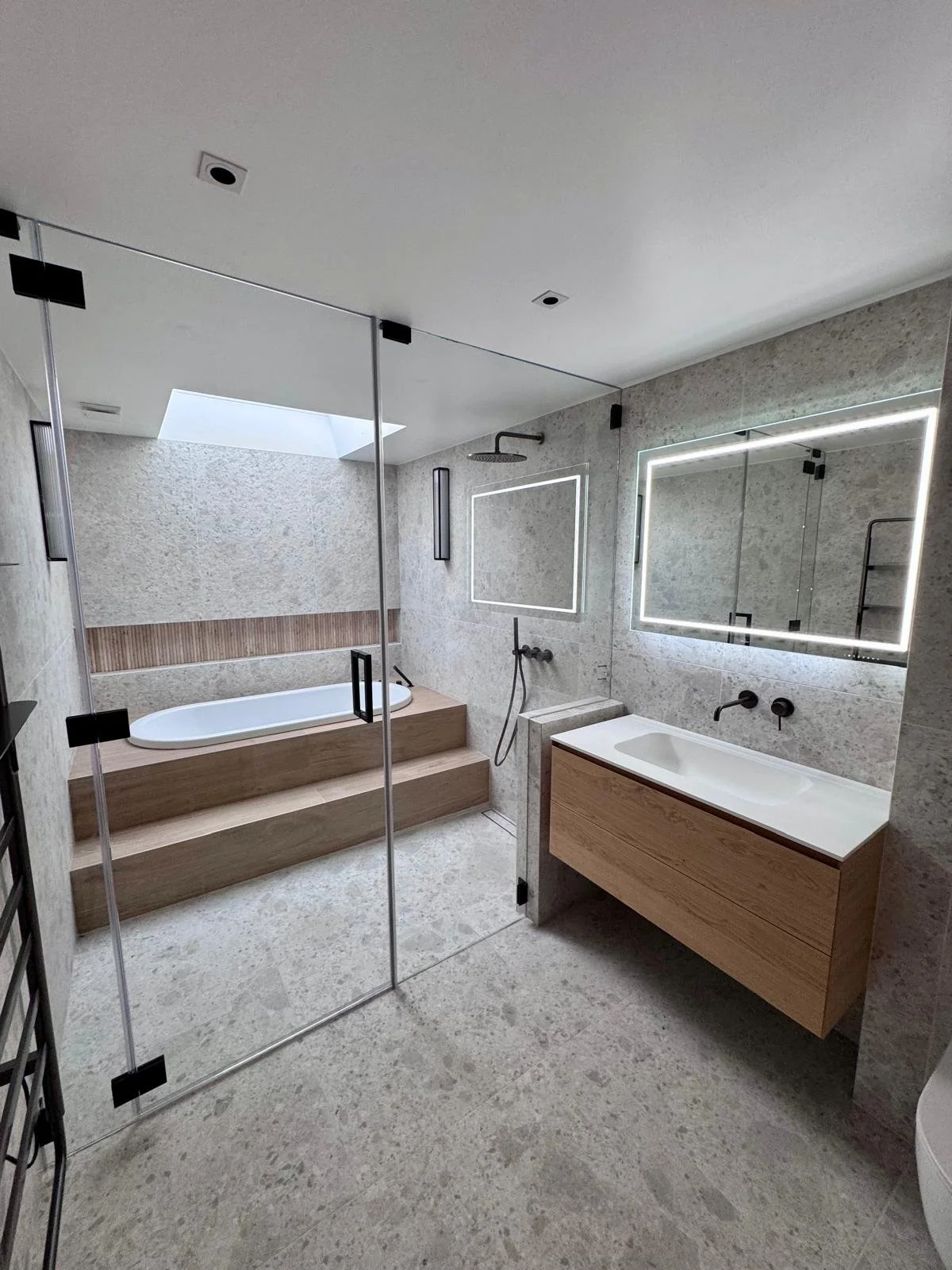 Bespoke Frameless 10mm Glass Shower Enclosure with Satin Black Hardware – London
