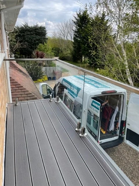 glass-balustrade-spigot-system-timber-deck-surrey.jpg