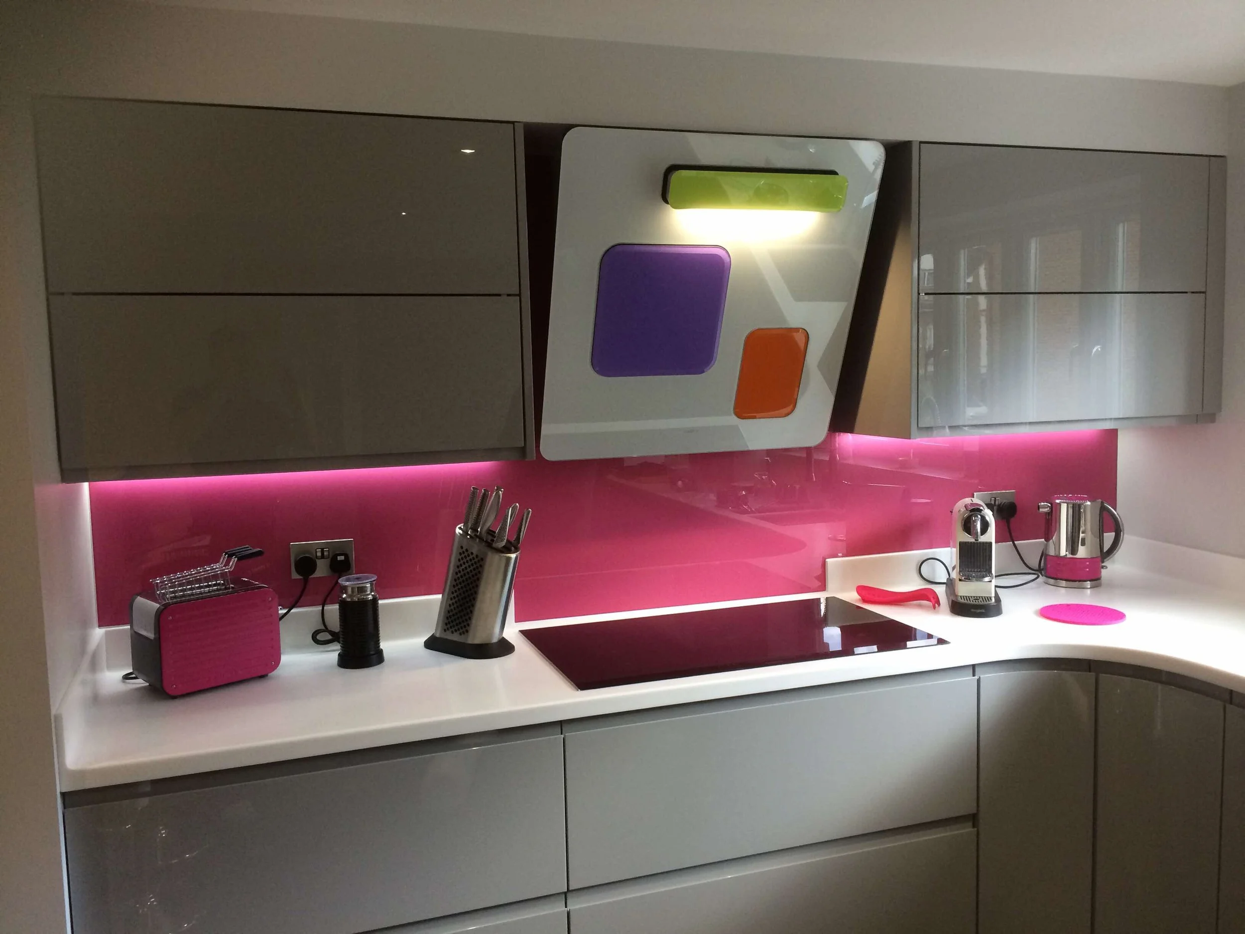 pink glass splashback modern kitchen installation.JPG