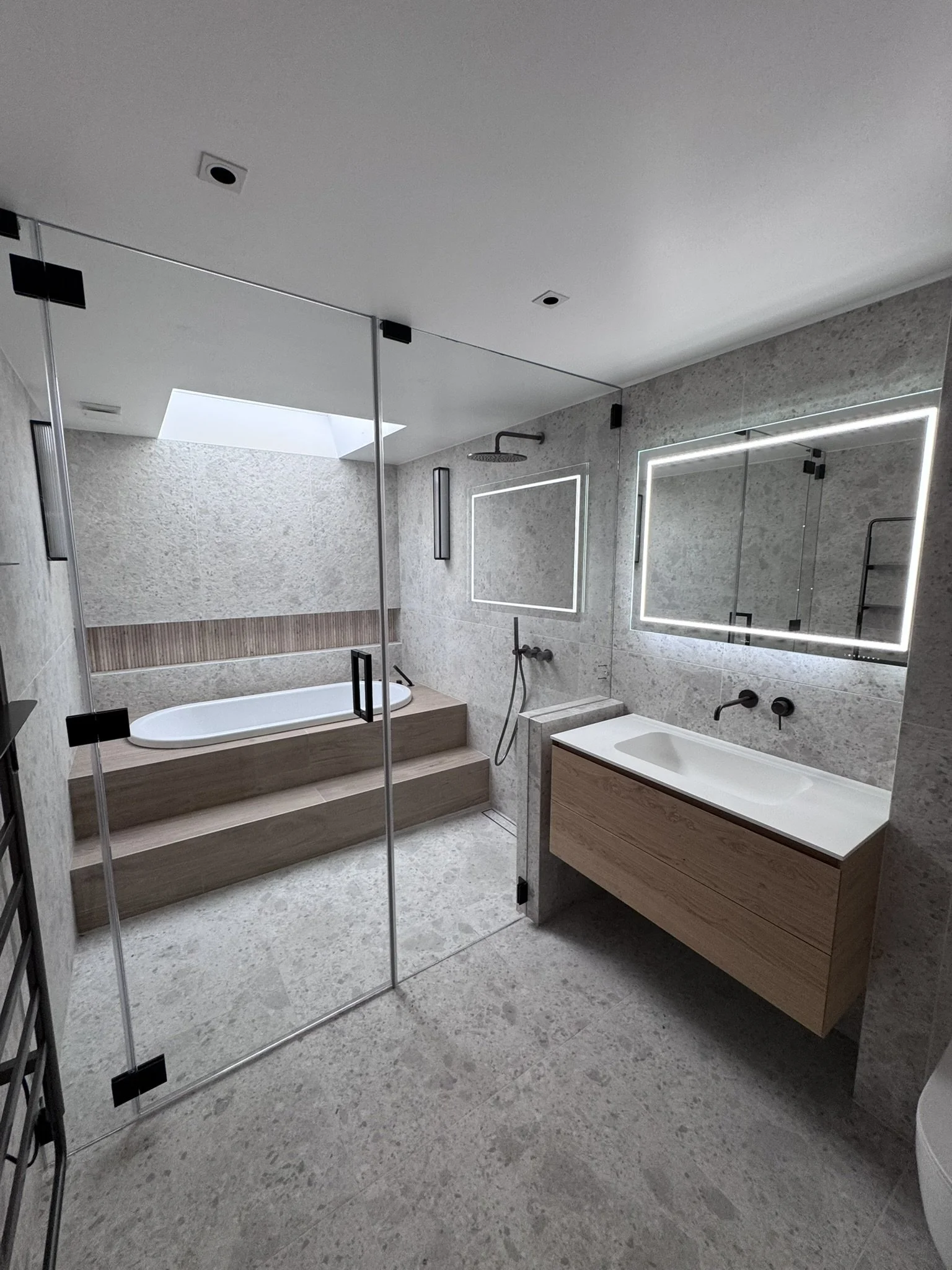 Toughened glass shower screens and enclosures manufactured to size with polished edges and specialist fittings