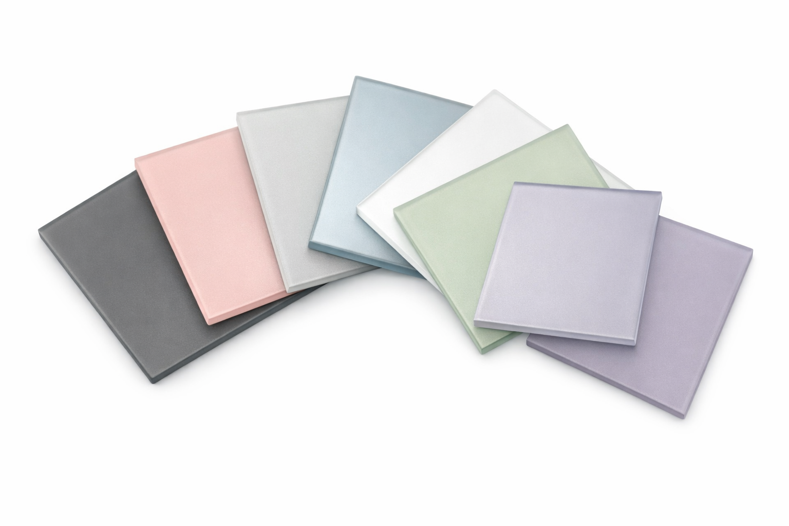 Satin finish coloured glass splashback samples fanned out showing matte anti glare satin glass options for kitchens and bathrooms