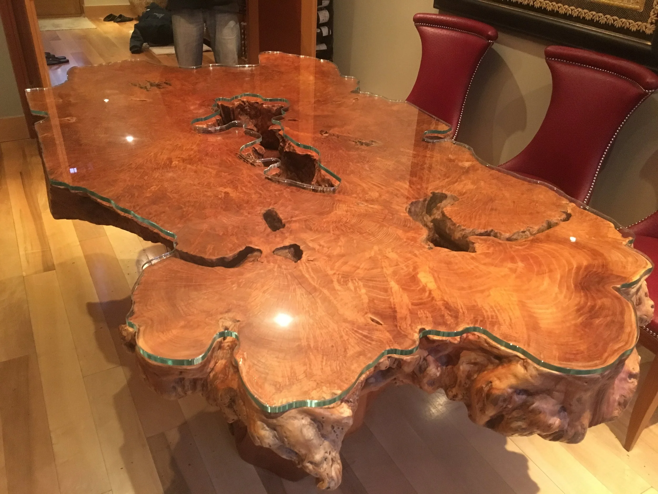 Bespoke glass tabletops and feature glass manufactured to custom shapes with polished edges