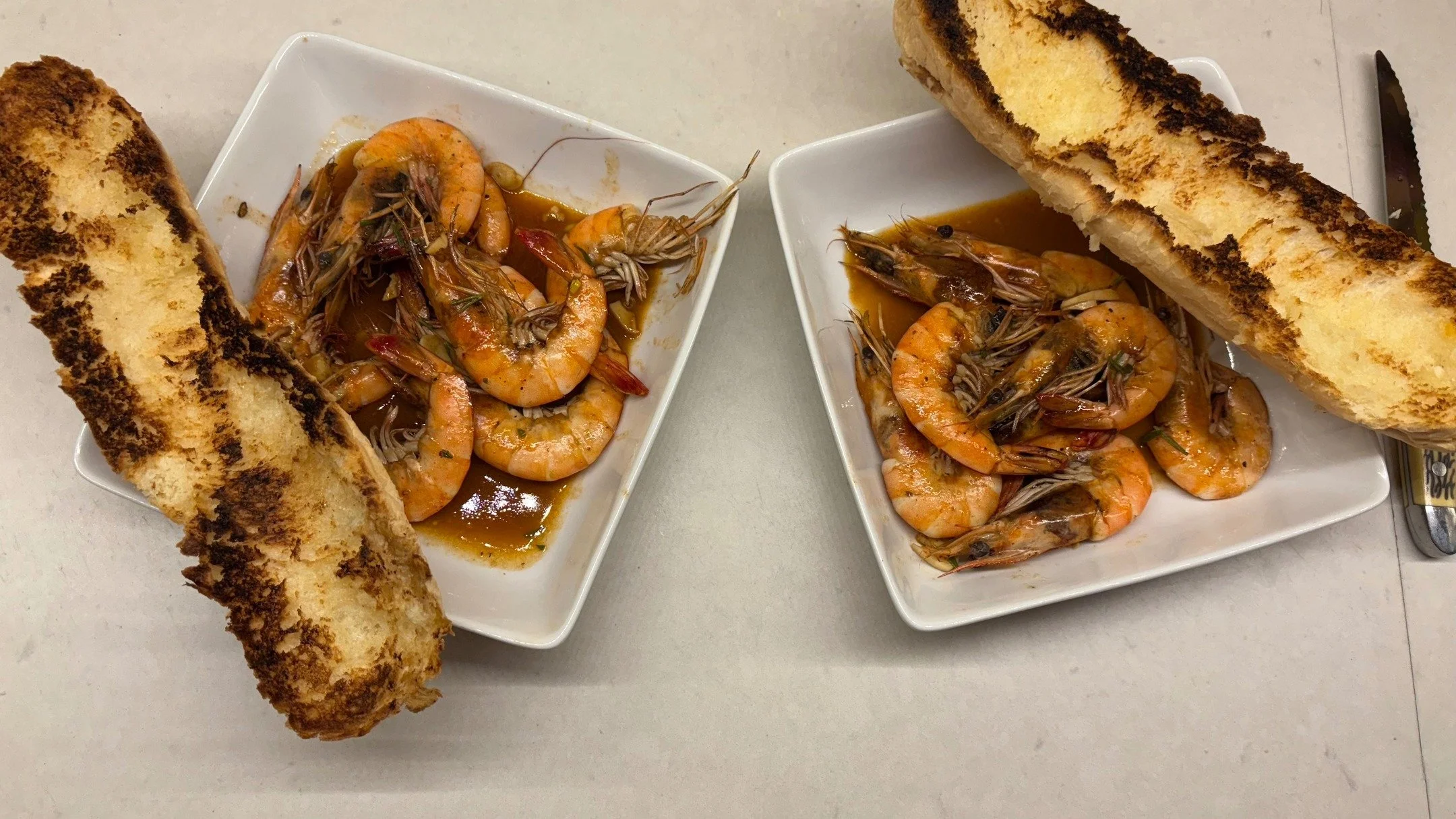 Brown food is the best food. Head-on BBQ shrimp for @hobbsblair for dinner last night. Cheap and big shrimp from B and J Seafood in Hammond, LA. Almost-burned bread from our faulty broiler.