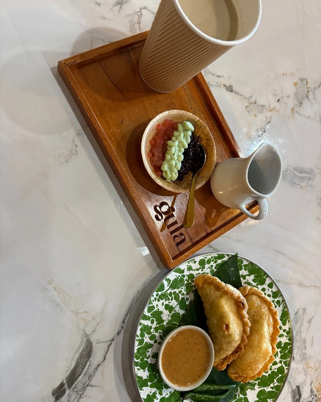 Thanks @soupbelly_atl for the @gula.atl rec and thanks Emma for the delicious ginger lemongrass drink and pastel. Quick scout snack for @truesouthtv on the way to Athens.