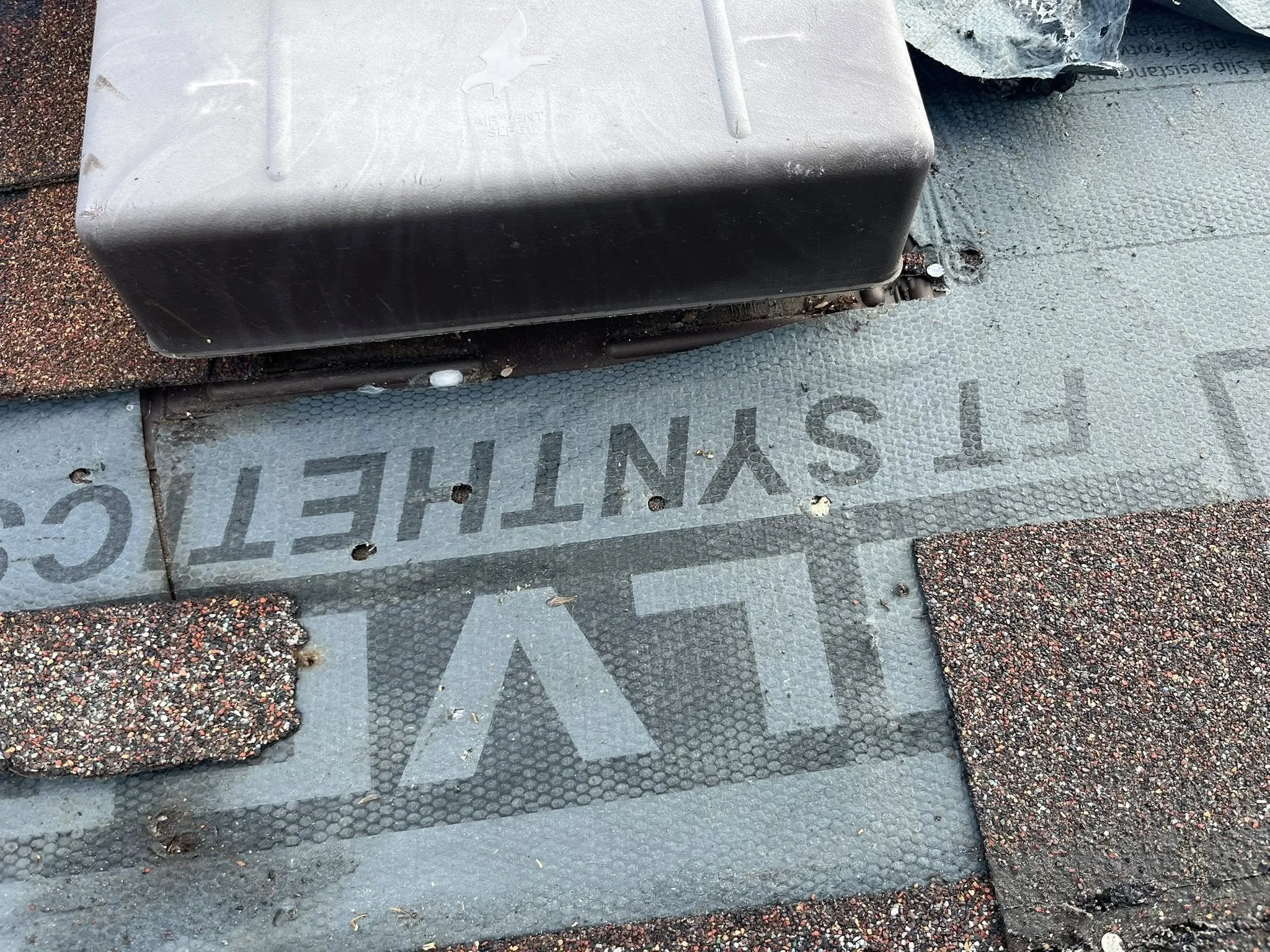 Improper Water & Ice Shield placement caused roof leak. Vent boot should have been over, not under.