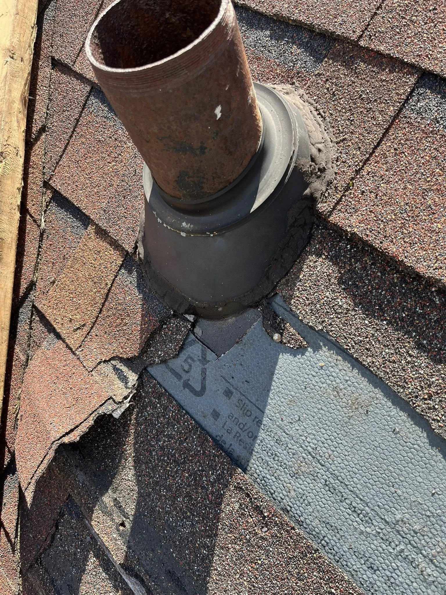 Roof leaked because previous roofer put vent boot under water and ice shield instead of over it.