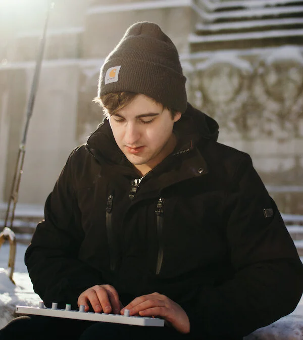 He began the writing process for this song outside, as part of a plein air experiment on Monument Circle. Photo by Heather Harper.
